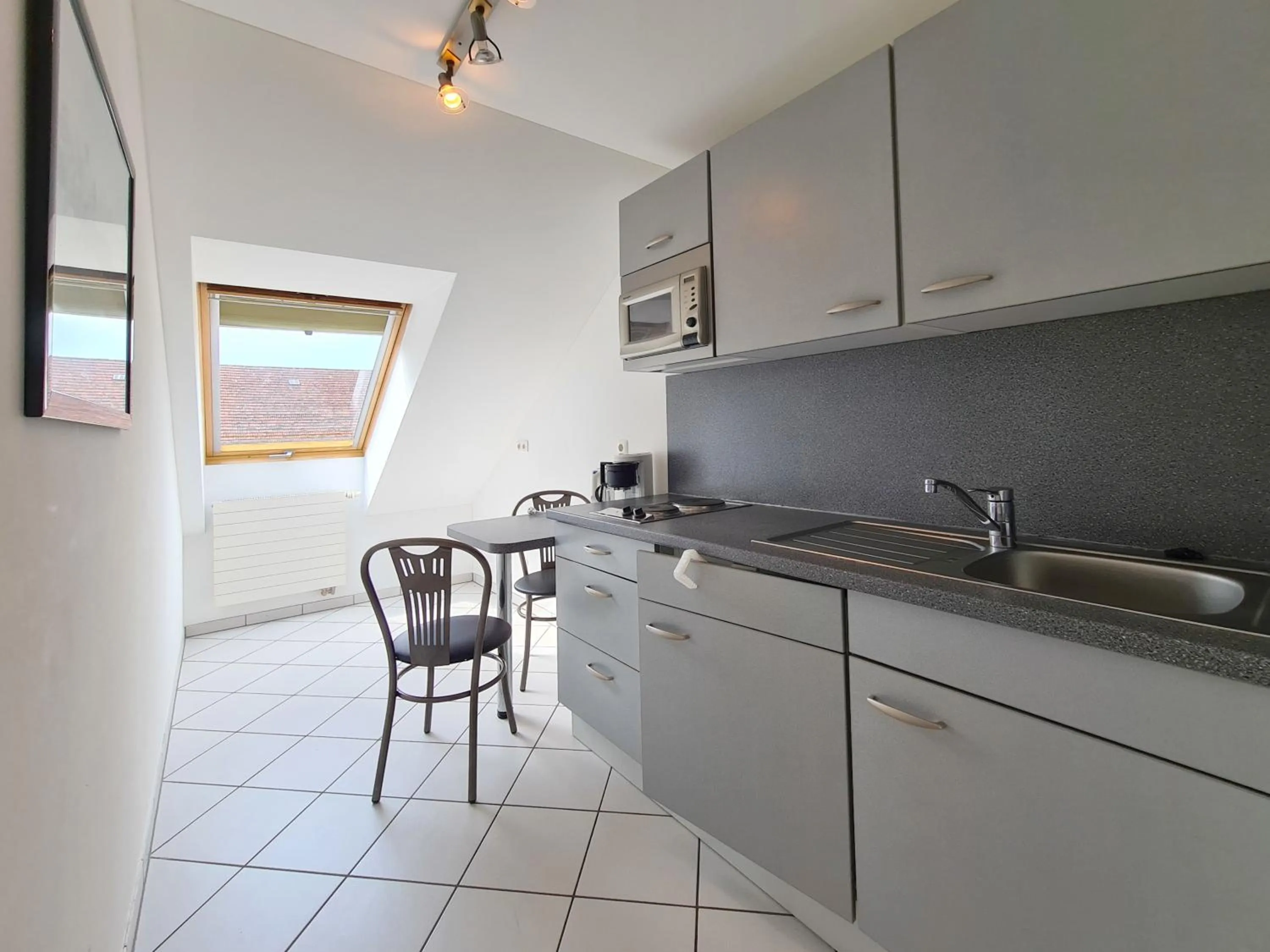 Kitchen or kitchenette in Hotel am Hachinger Bach by Blattl