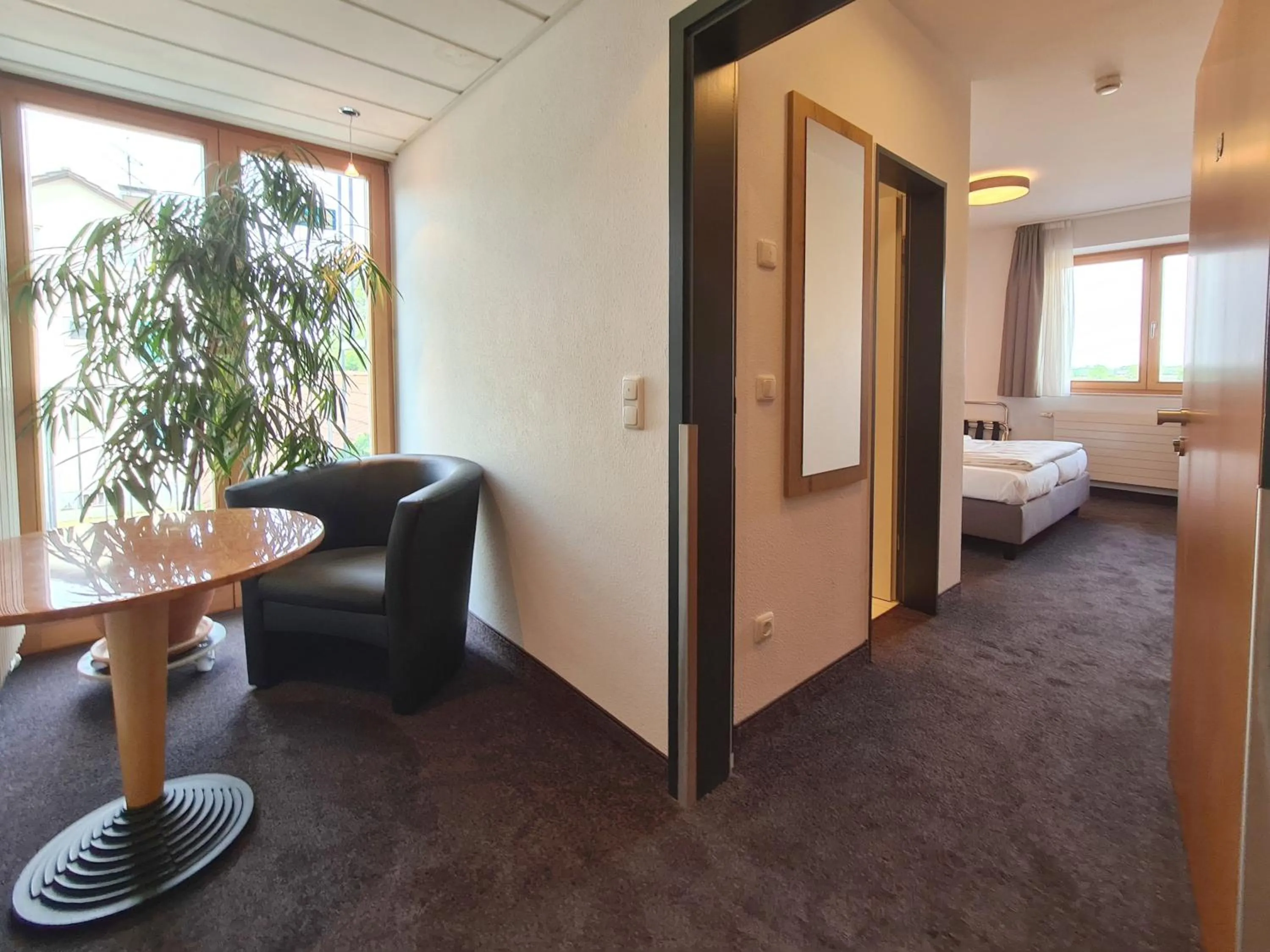 Seating area, Bed in Hotel am Hachinger Bach by Blattl