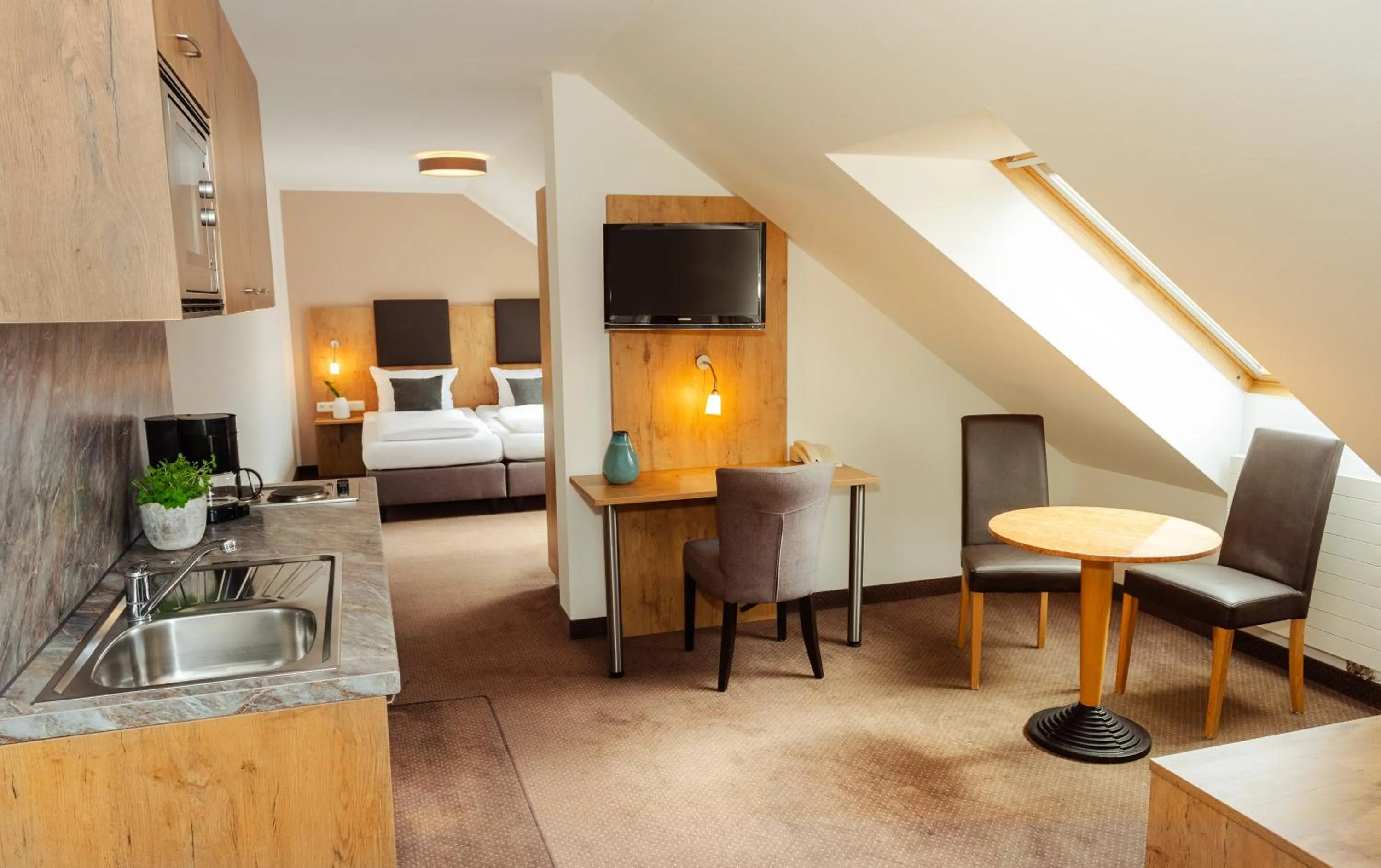 Photo of the whole room, Bed in Hotel am Hachinger Bach by Blattl