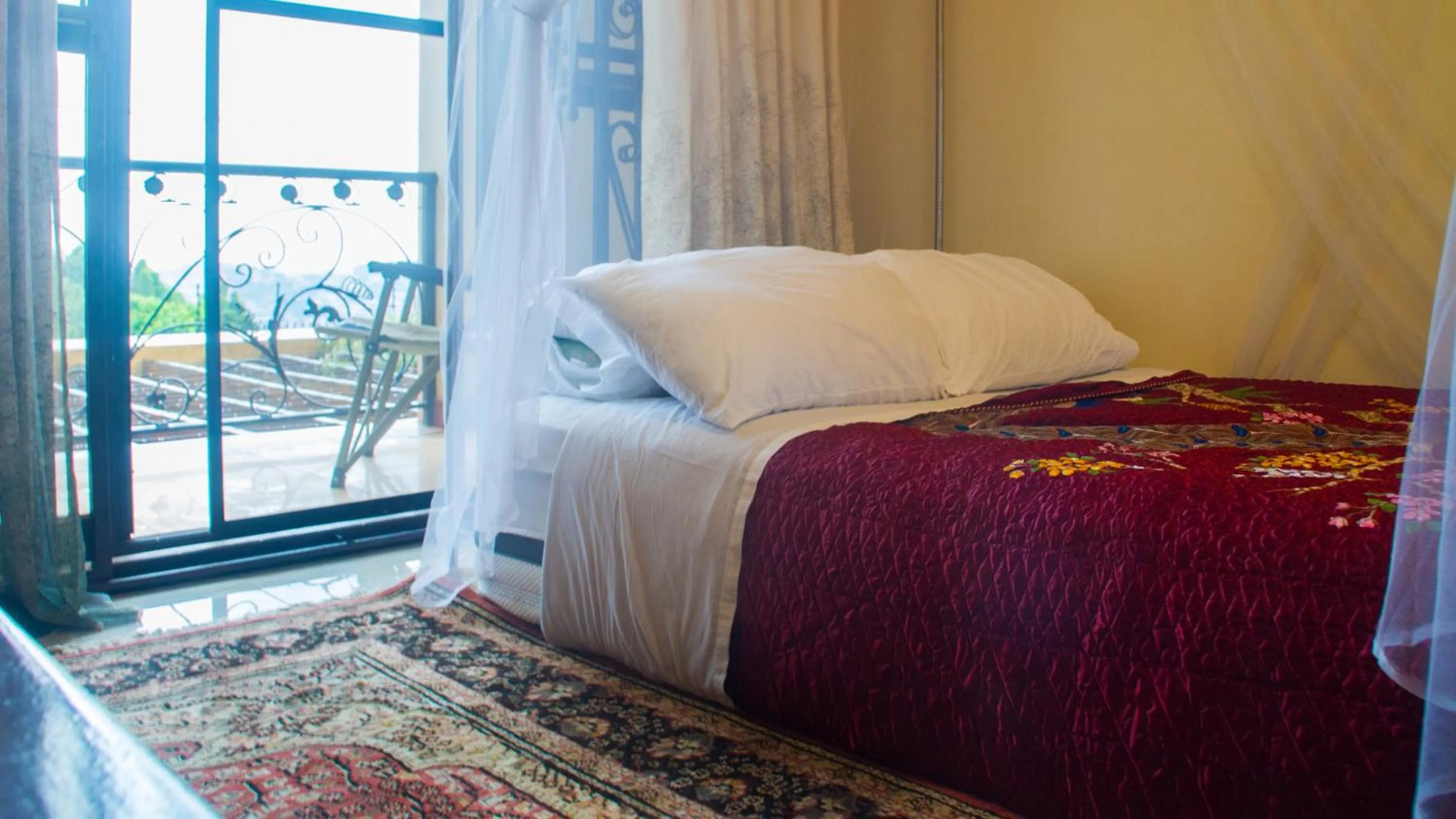 Bed in Bona Safari Villa Bunamwaya