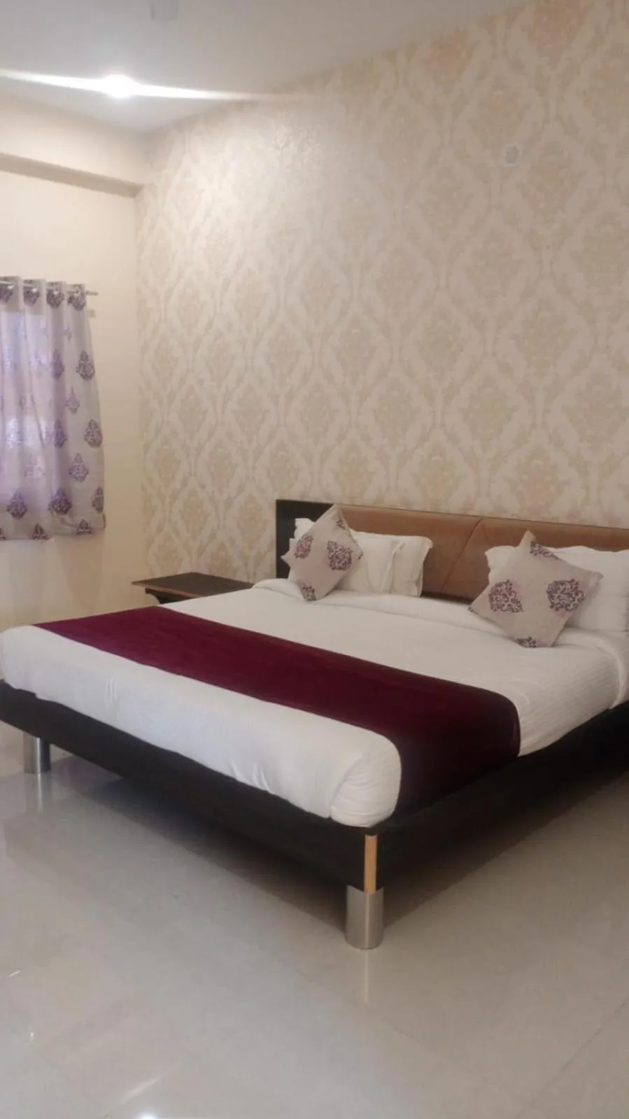 Bed in Vijayam Resort