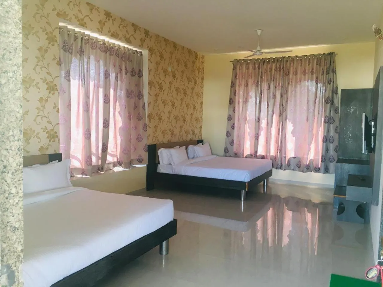 Bed in Vijayam Resort