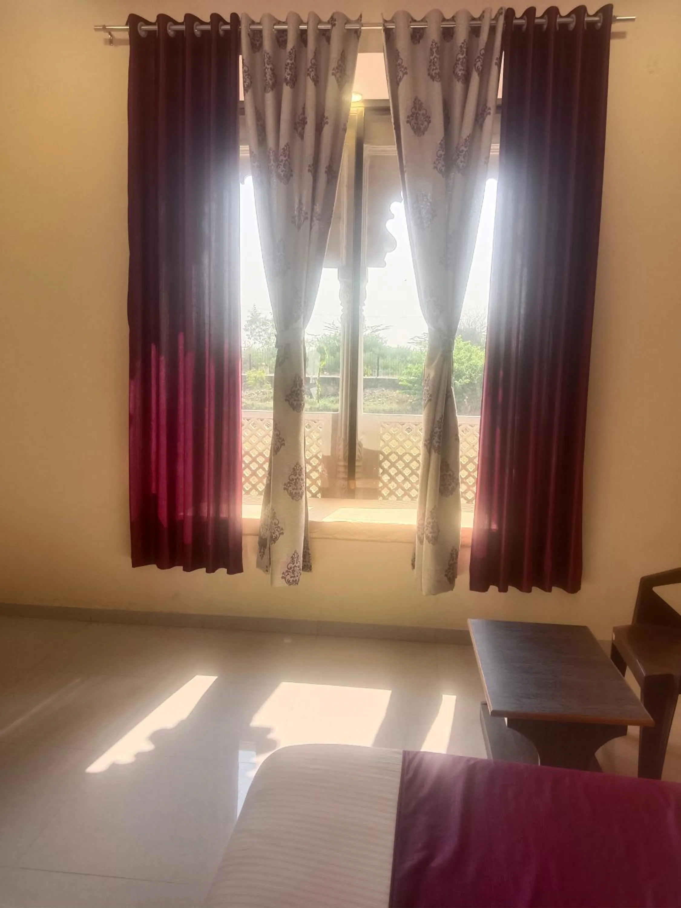 Bed in Vijayam Resort