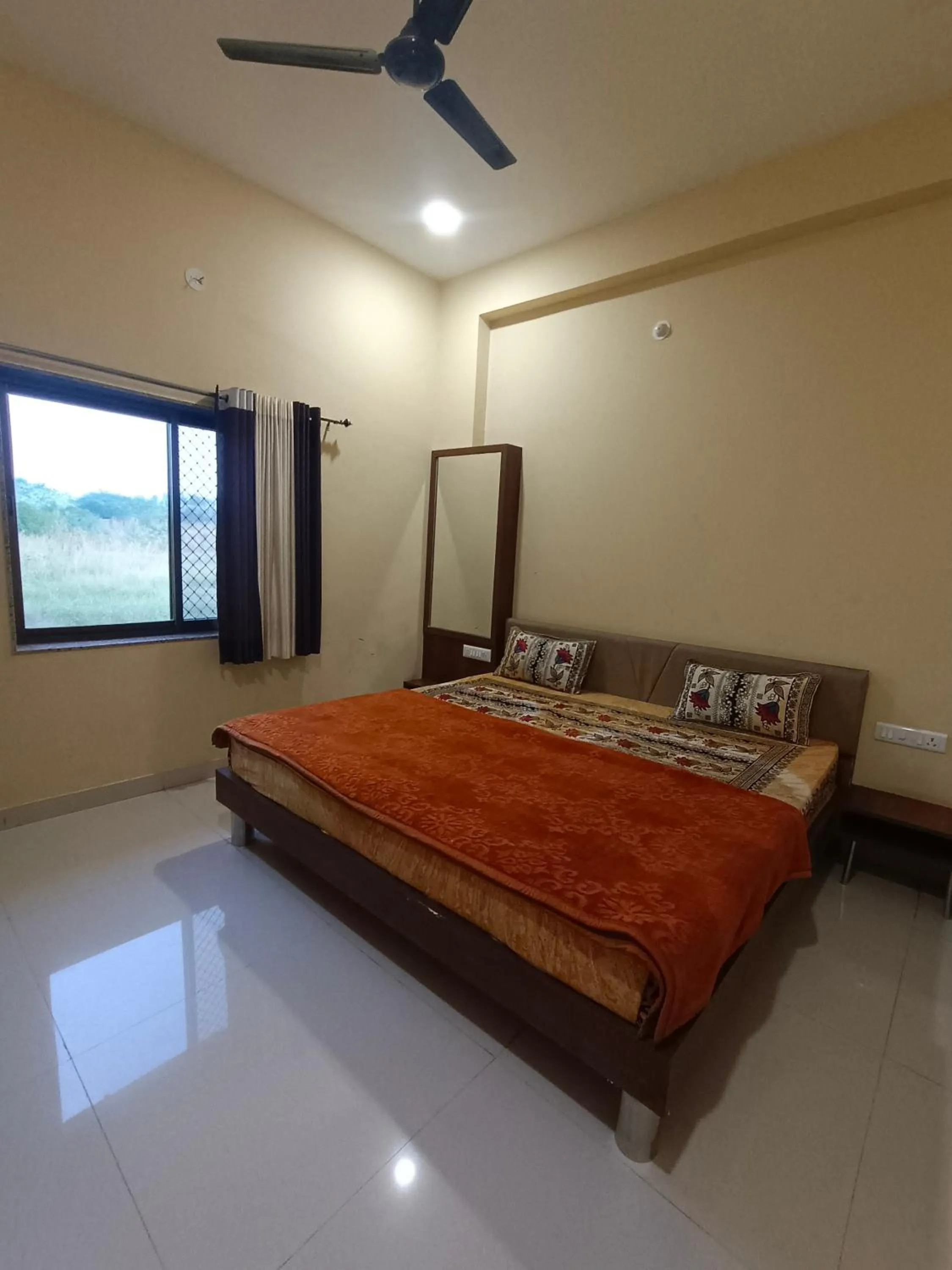 Bed in Vijayam Resort