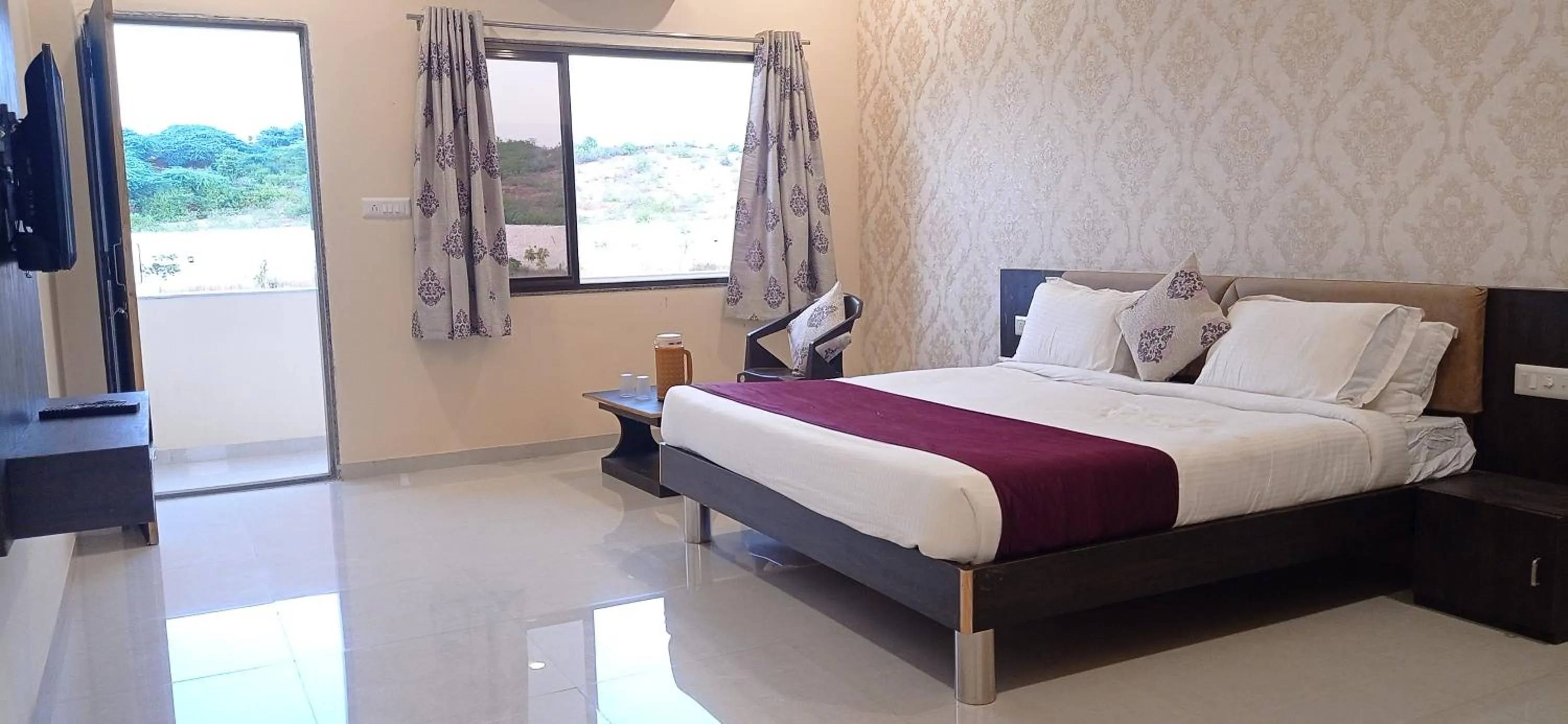 Bed in Vijayam Resort
