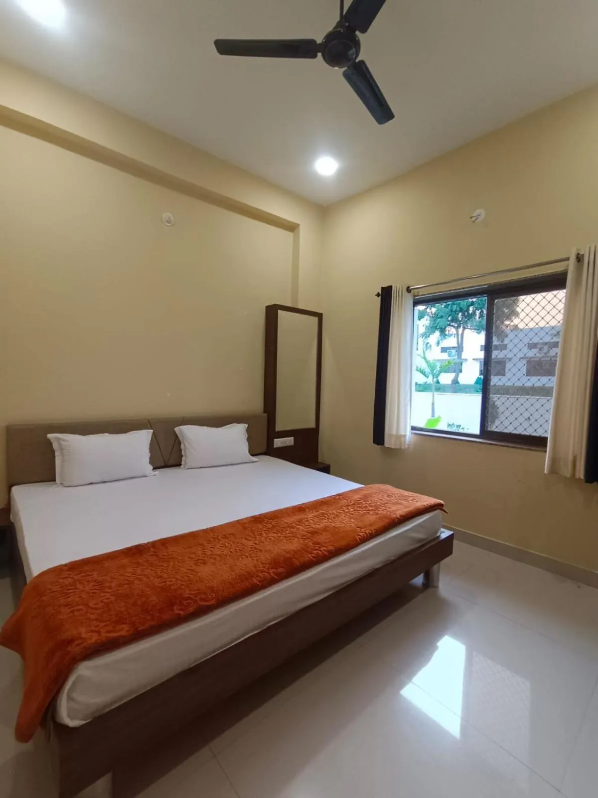 Bed in Vijayam Resort