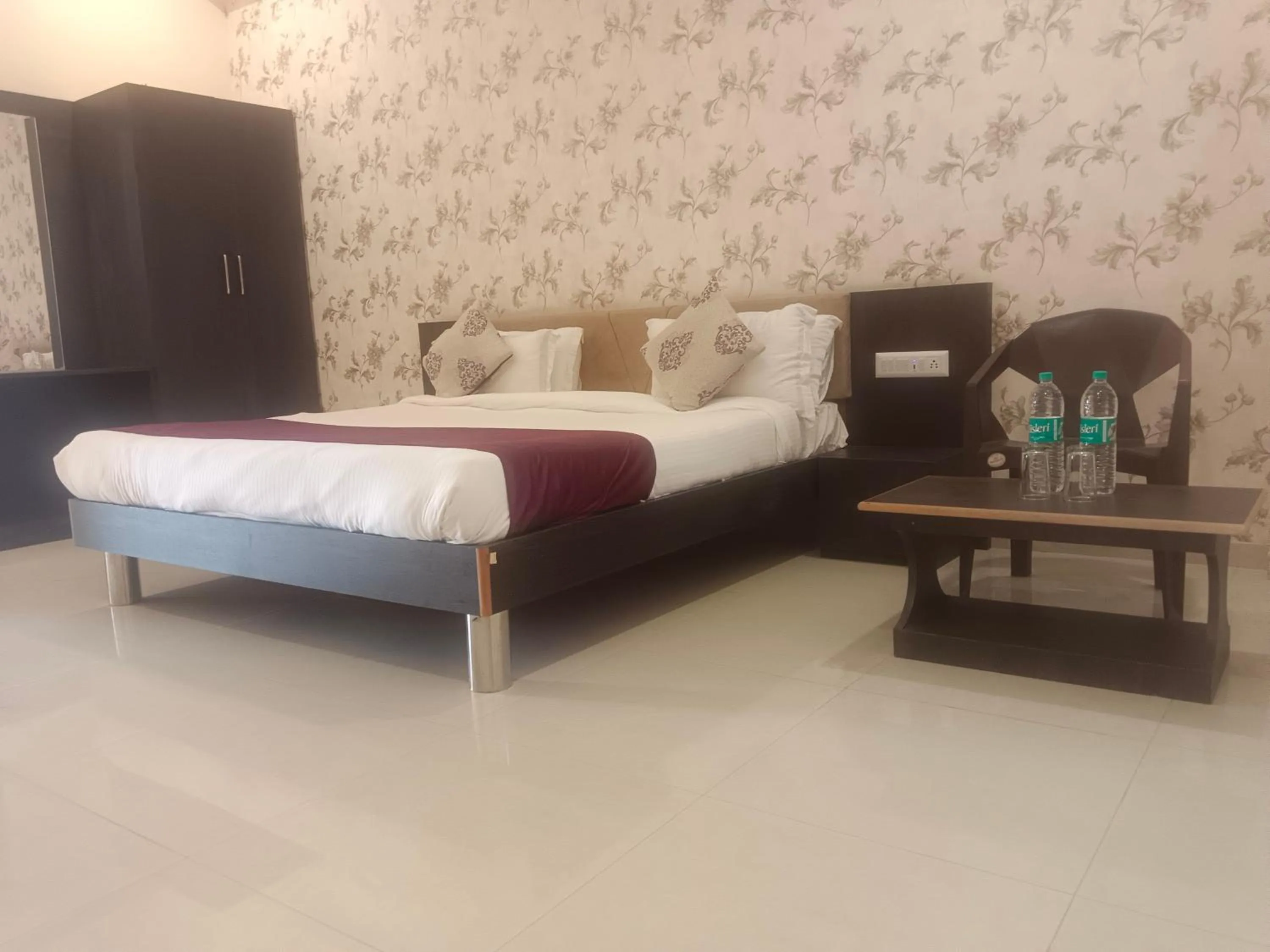 Bed in Vijayam Resort
