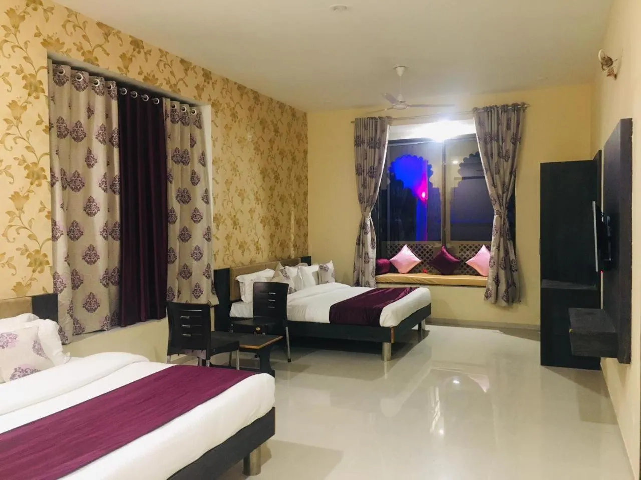 Bed in Vijayam Resort