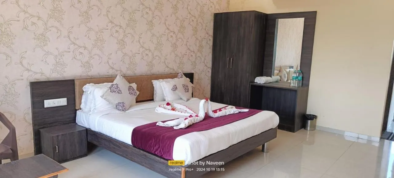 Bed in Vijayam Resort