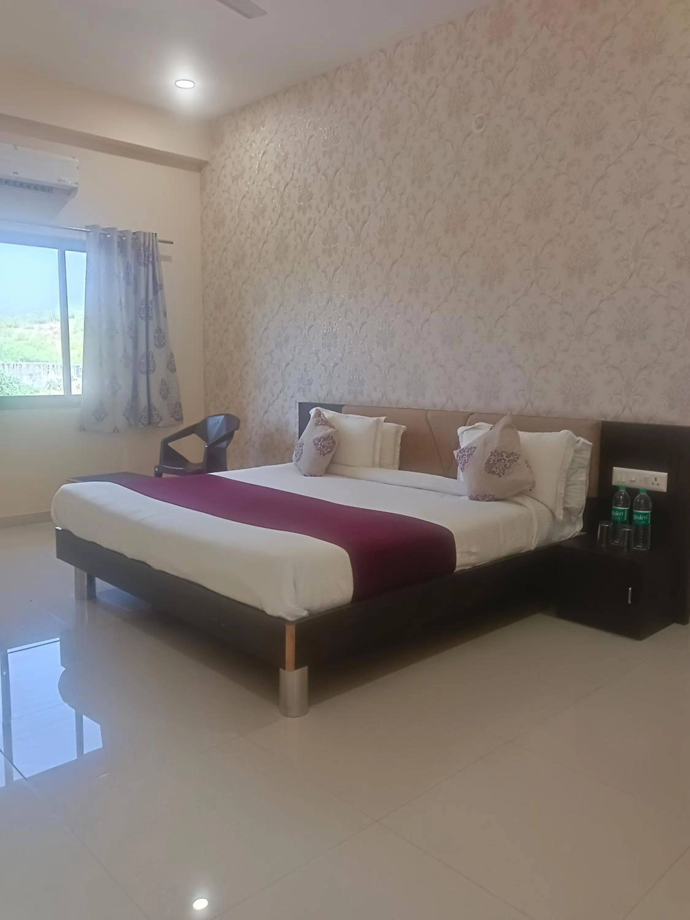 Bed in Vijayam Resort