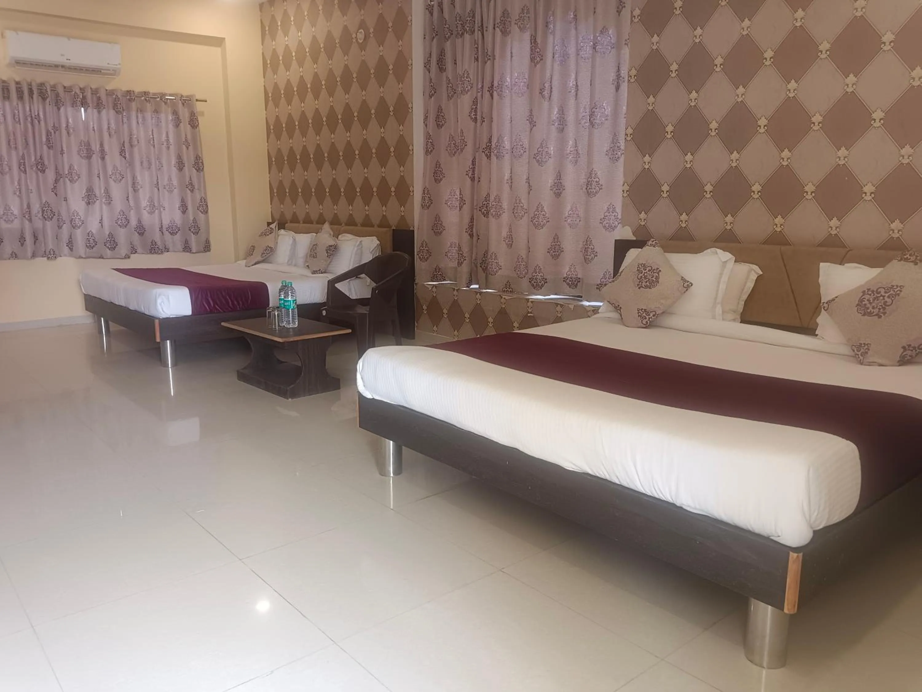 Bed in Vijayam Resort