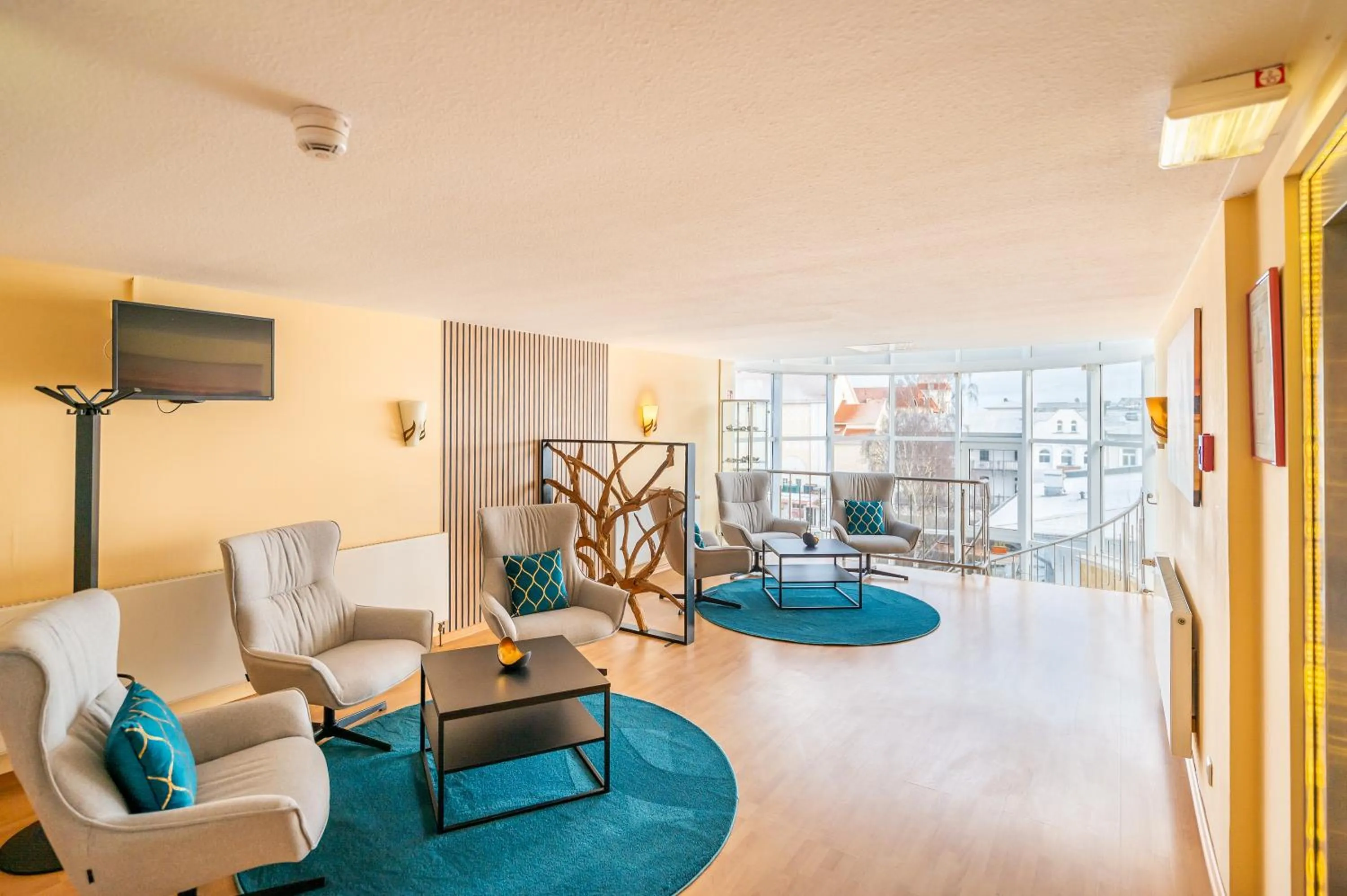 Communal lounge/ TV room in Centralhotel Binz