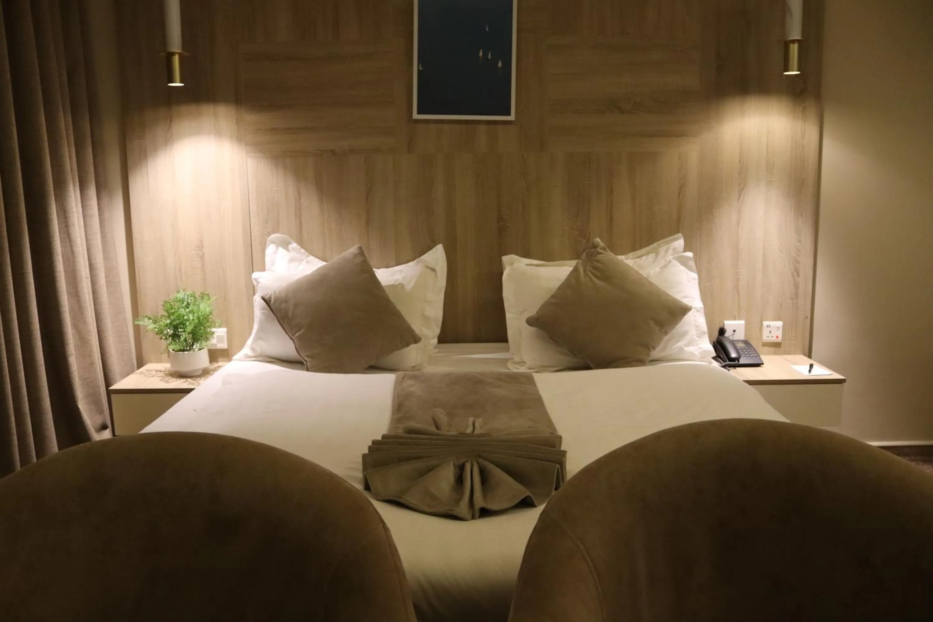 Bed in Twins Boutique Hotel