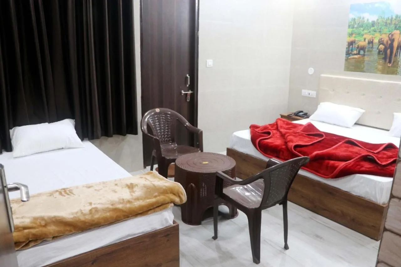 Photo of the whole room, Bed in Krishna Dreams