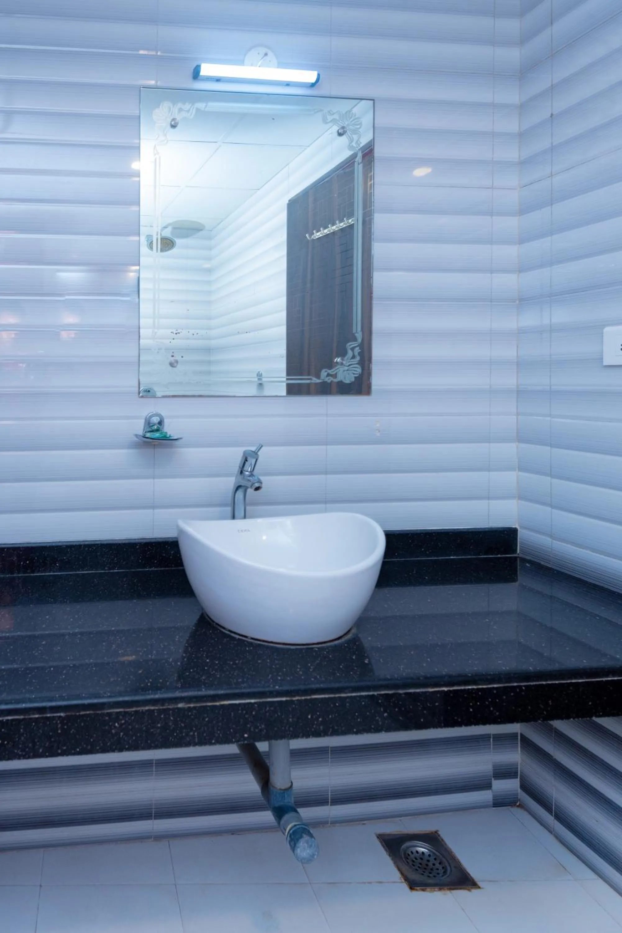 Bathroom in HOTEL AVISHA Residency