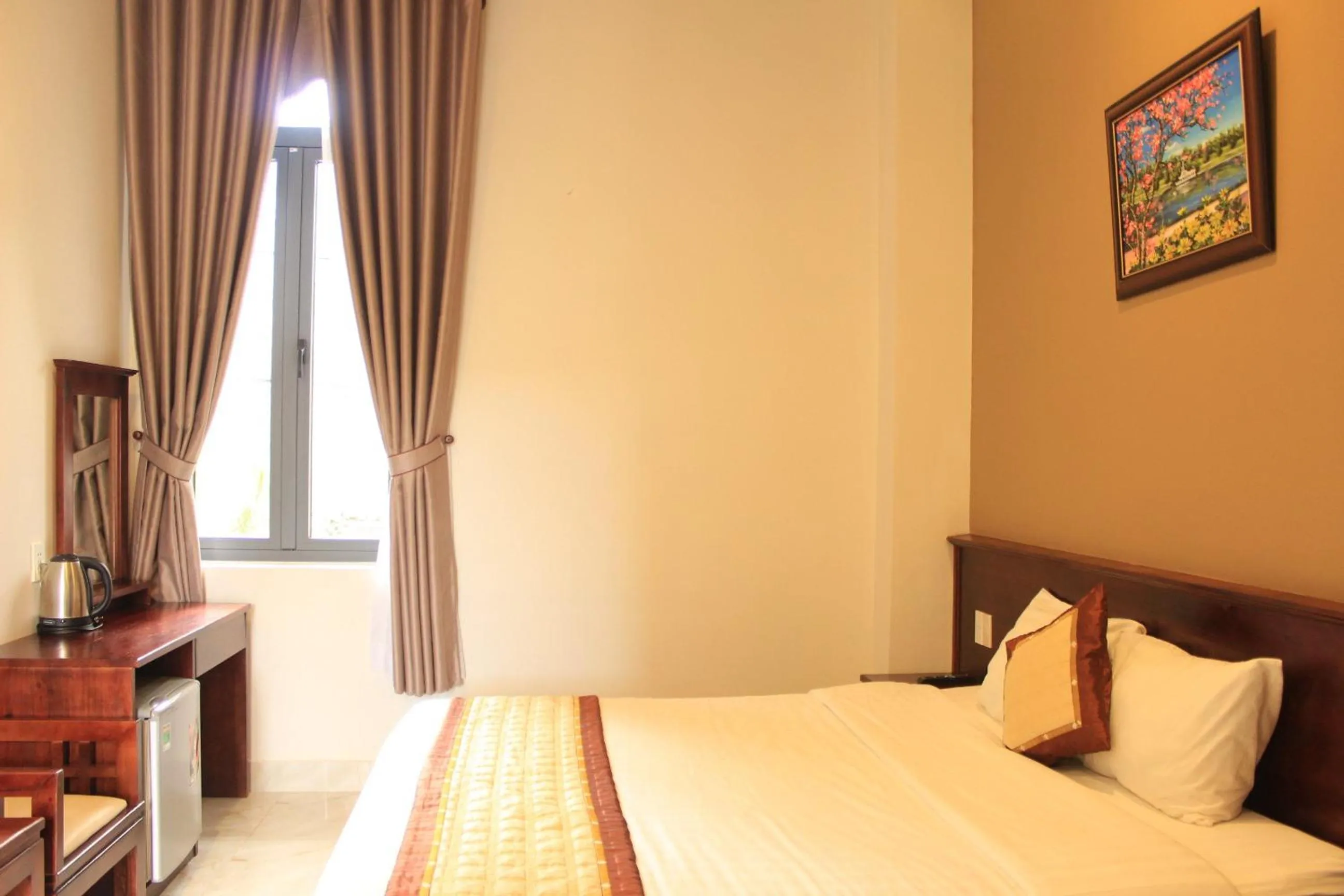 Bed in Bonjour Da Lat Hotel