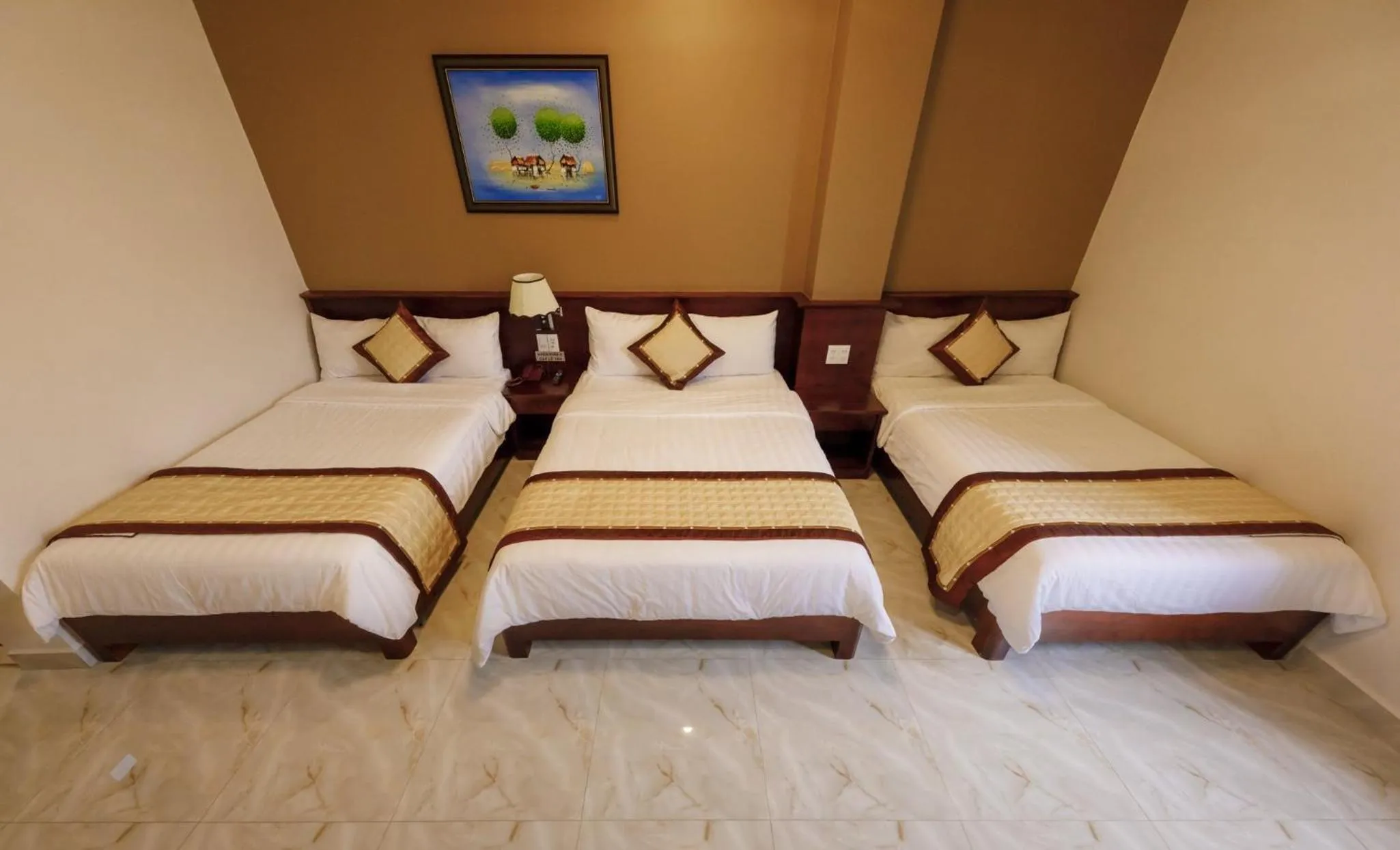 Bed in Bonjour Da Lat Hotel