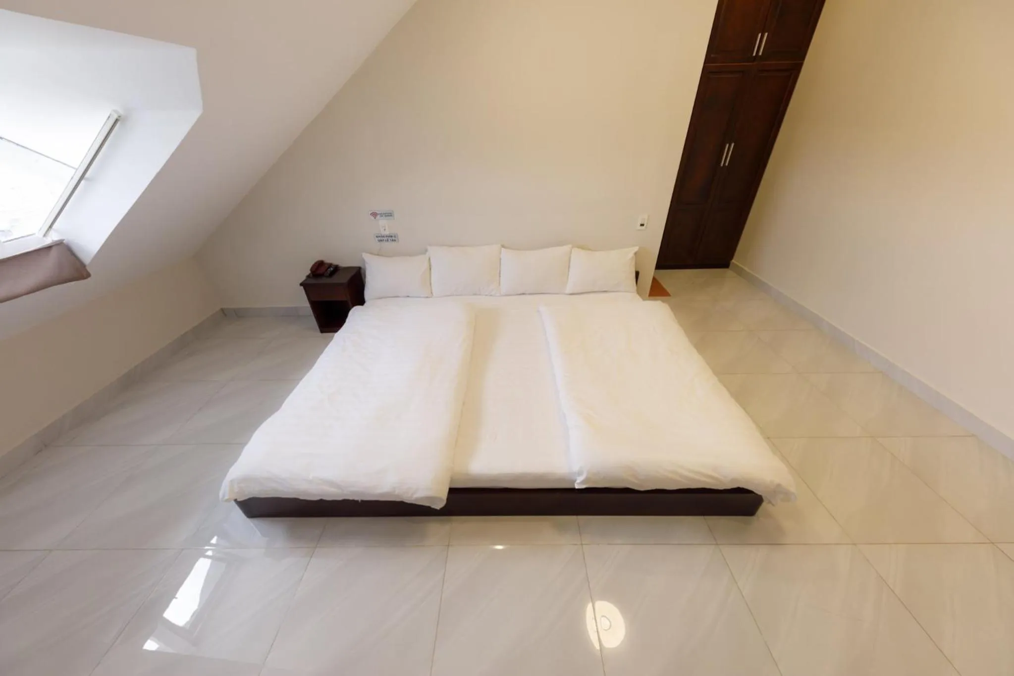 Bed in Bonjour Da Lat Hotel