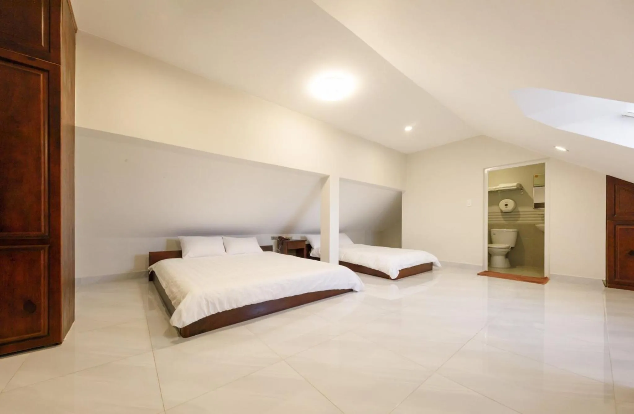 Bed in Bonjour Da Lat Hotel