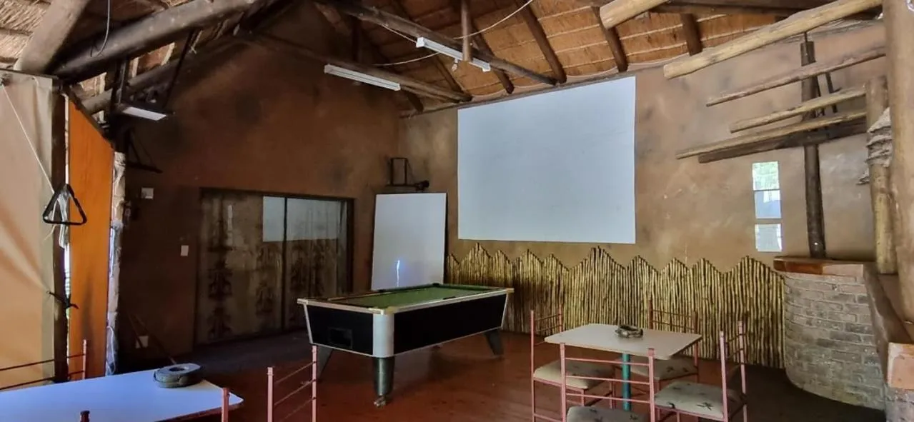 Communal lounge/ TV room in Thornycroft Lodge