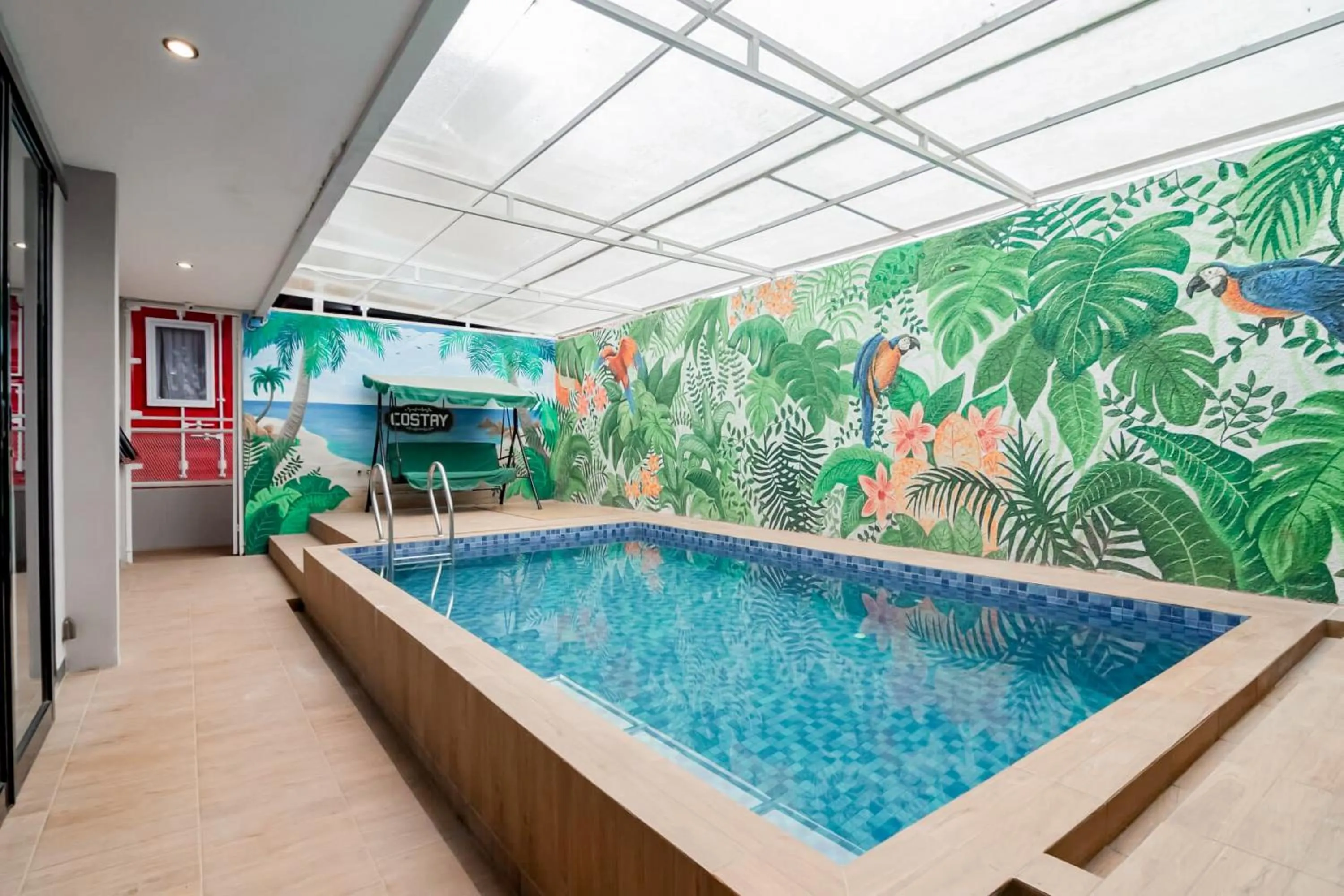 Swimming pool in RedDoorz Plus near Lembang Park & Zoo