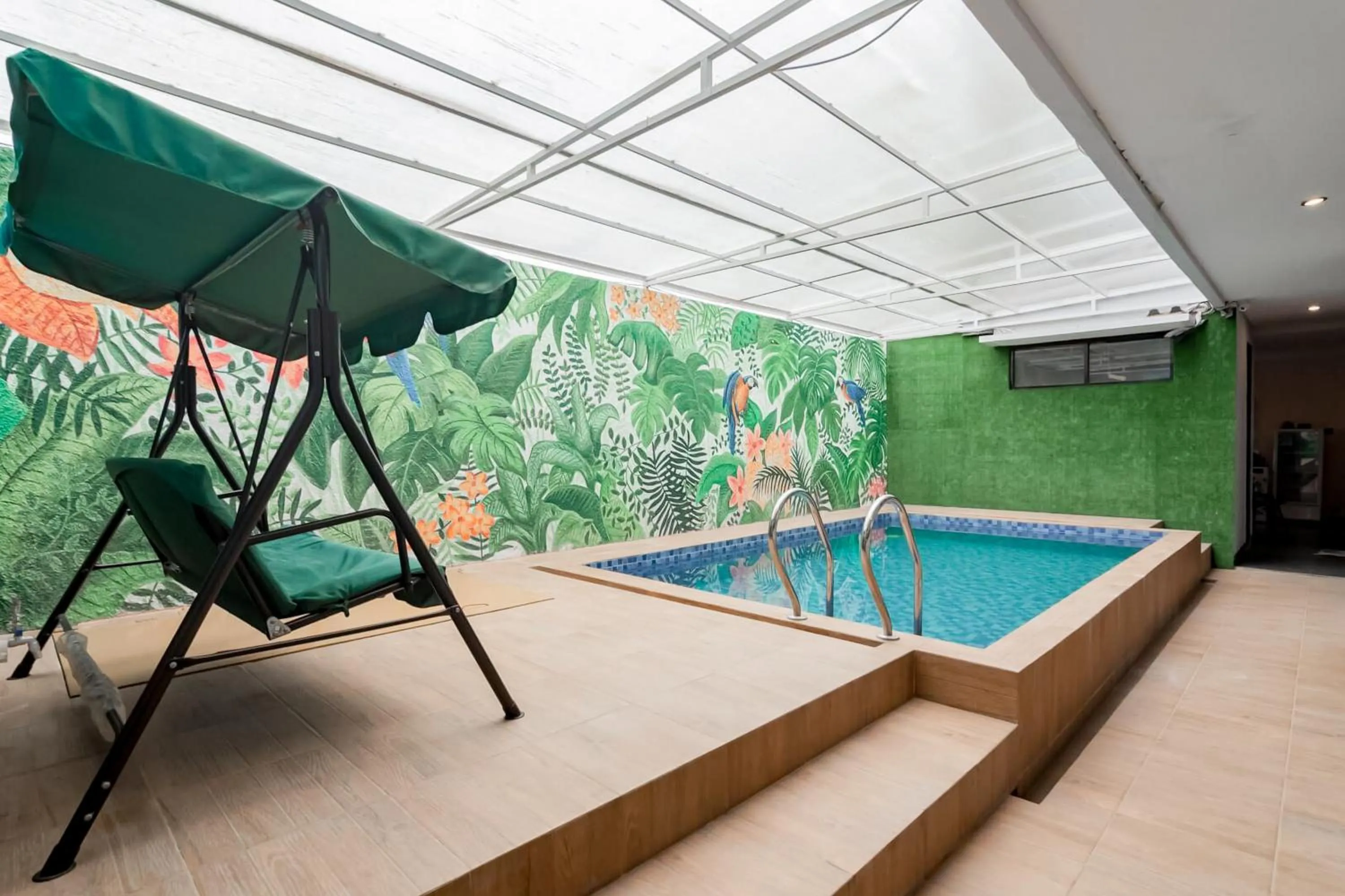 Swimming pool in RedDoorz Plus near Lembang Park & Zoo