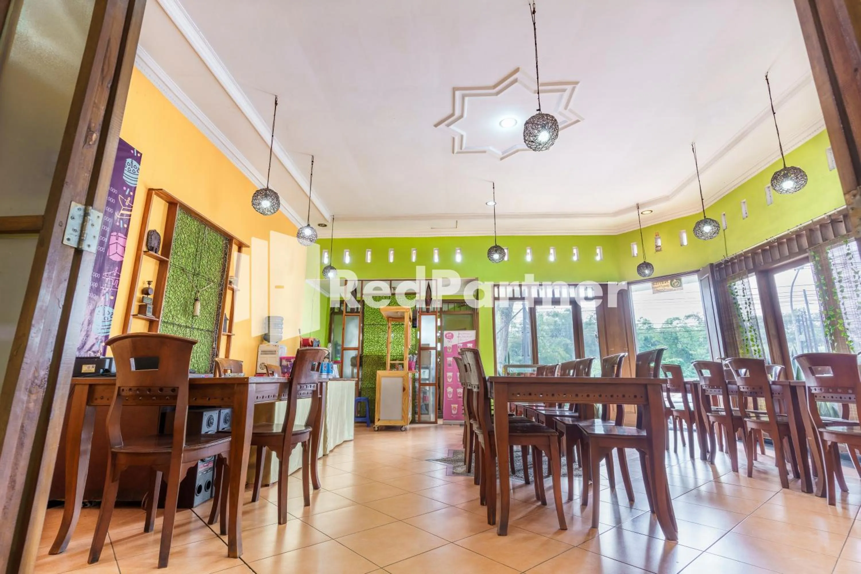 Seating area in Nafisa Homestay Syariah Near Jatim Park 3 Batu Mitra RedDoorz