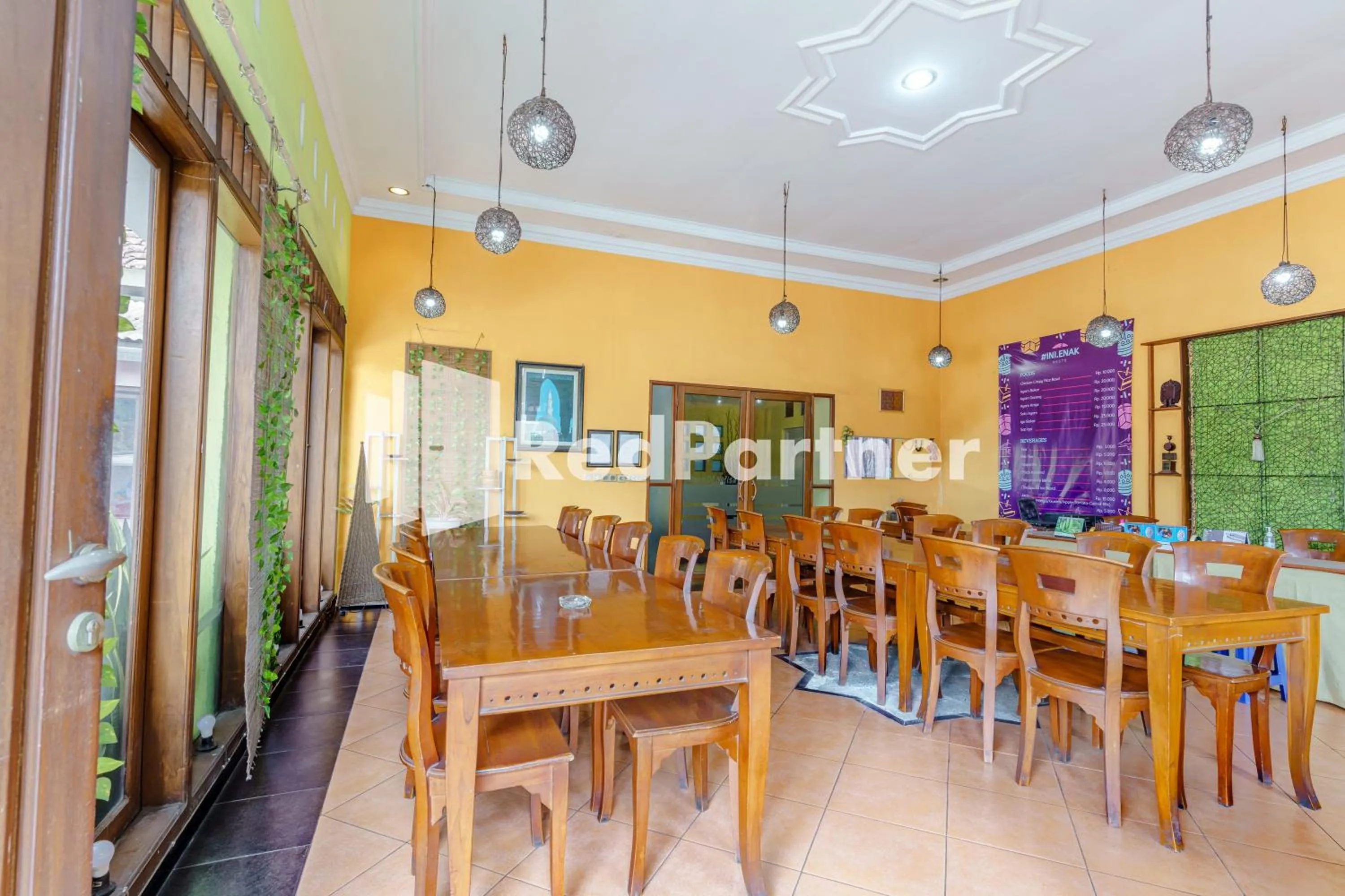 Seating area in Nafisa Homestay Syariah Near Jatim Park 3 Batu Mitra RedDoorz