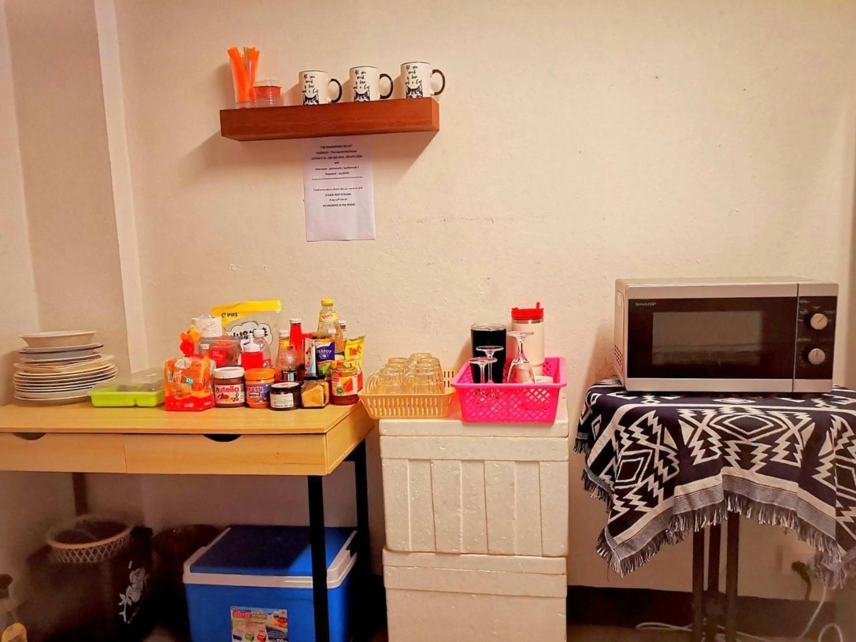 Kitchen or kitchenette, Bed in Newnormal Hotel