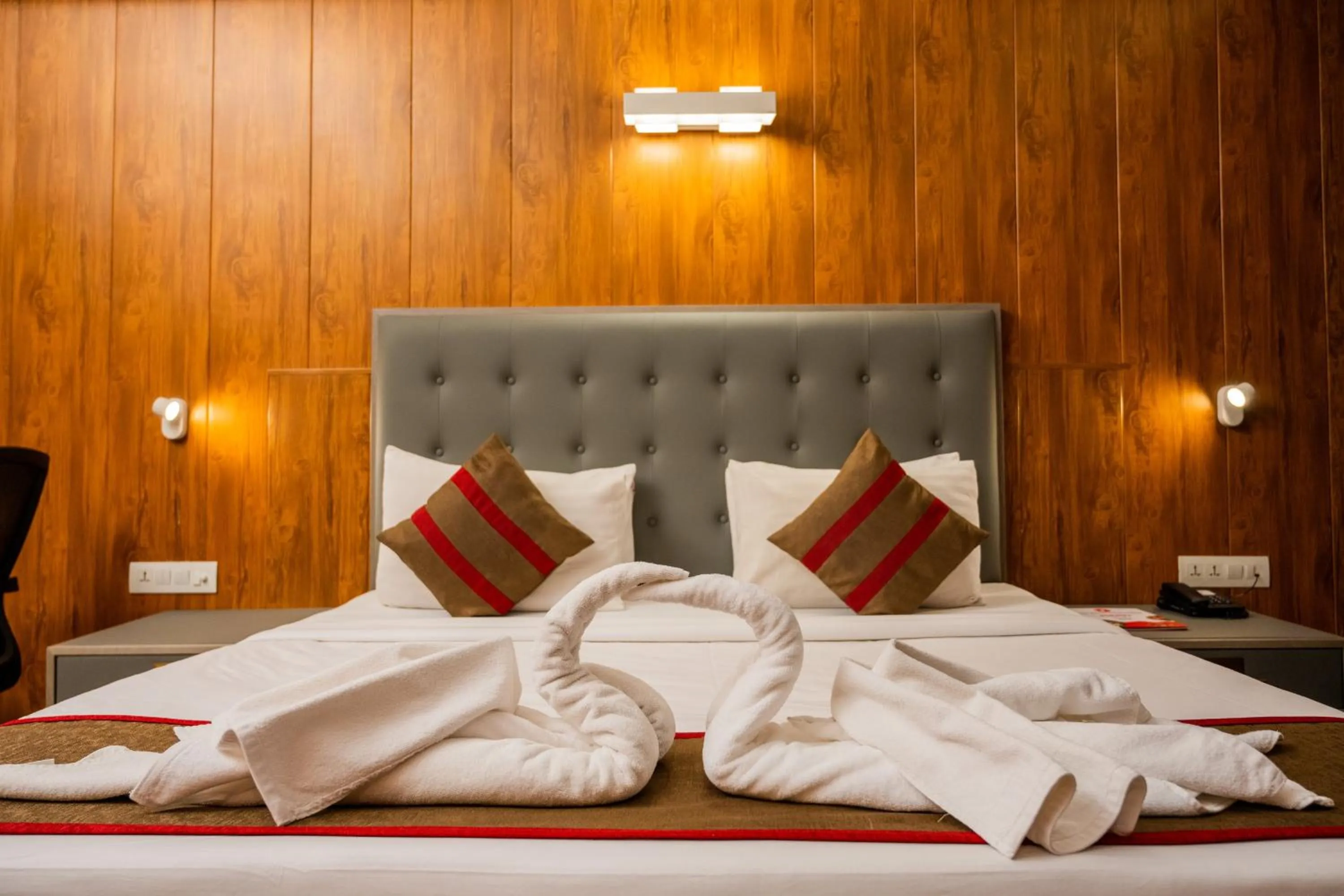 Bed in Hotel Asrani International