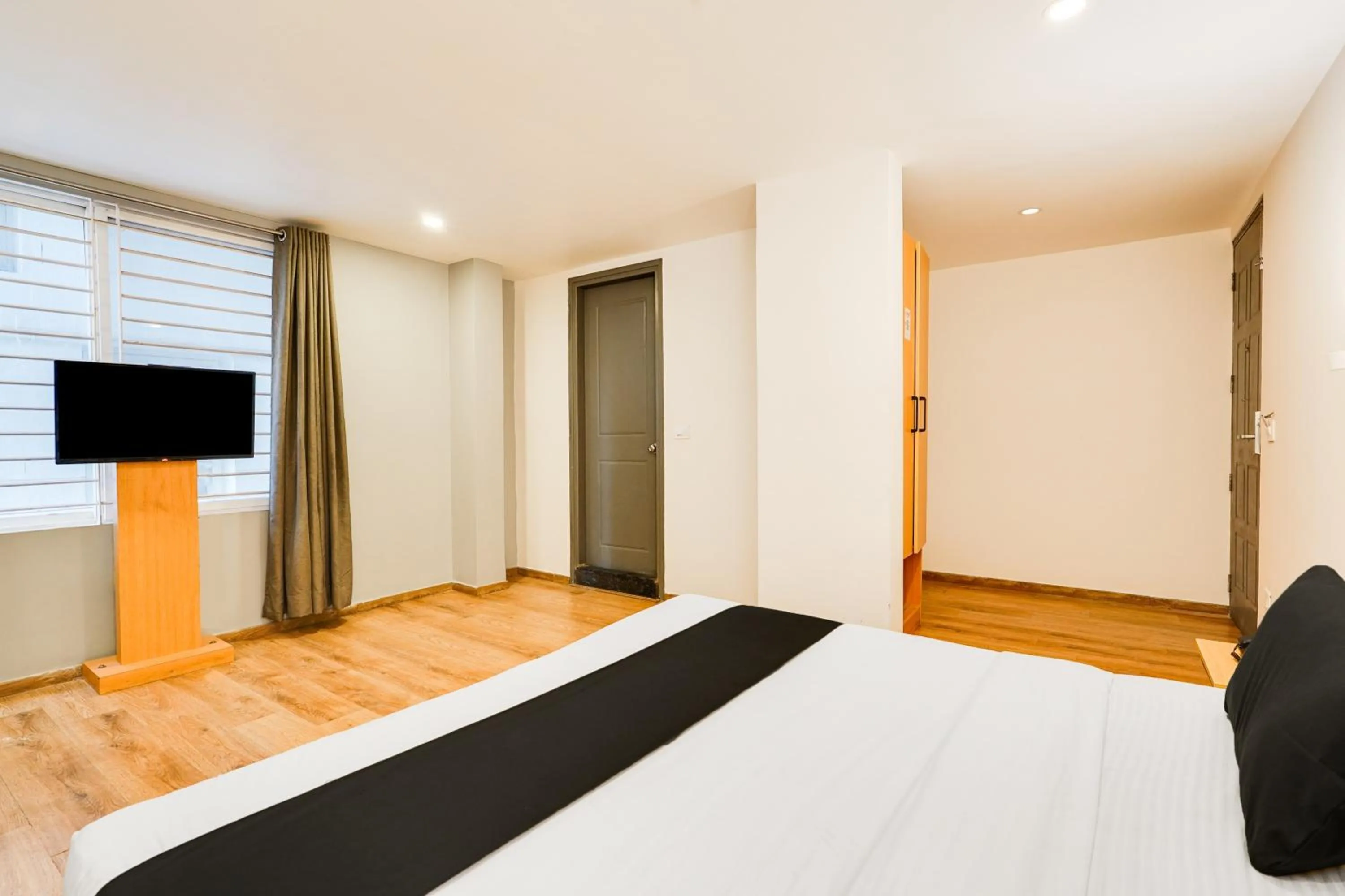 Bedroom in Super Townhouse Oak Indiranagar