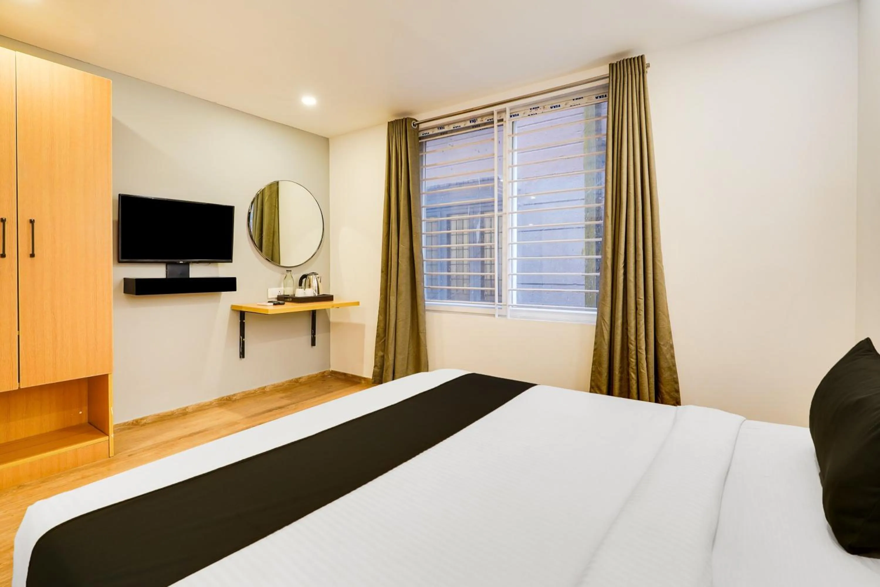 Bedroom in Super Townhouse Oak Indiranagar