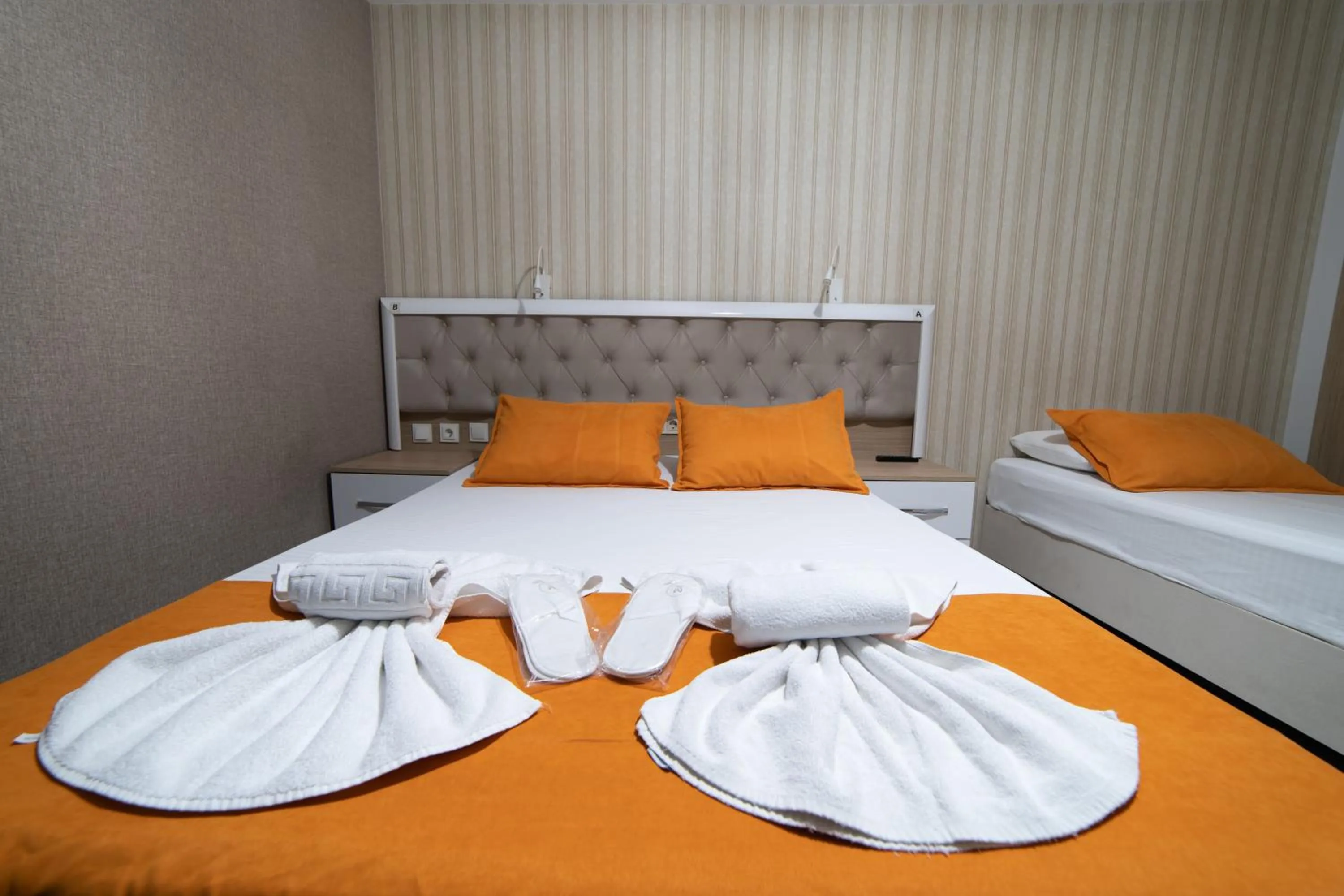 Bed in Mardy Suit Hotel