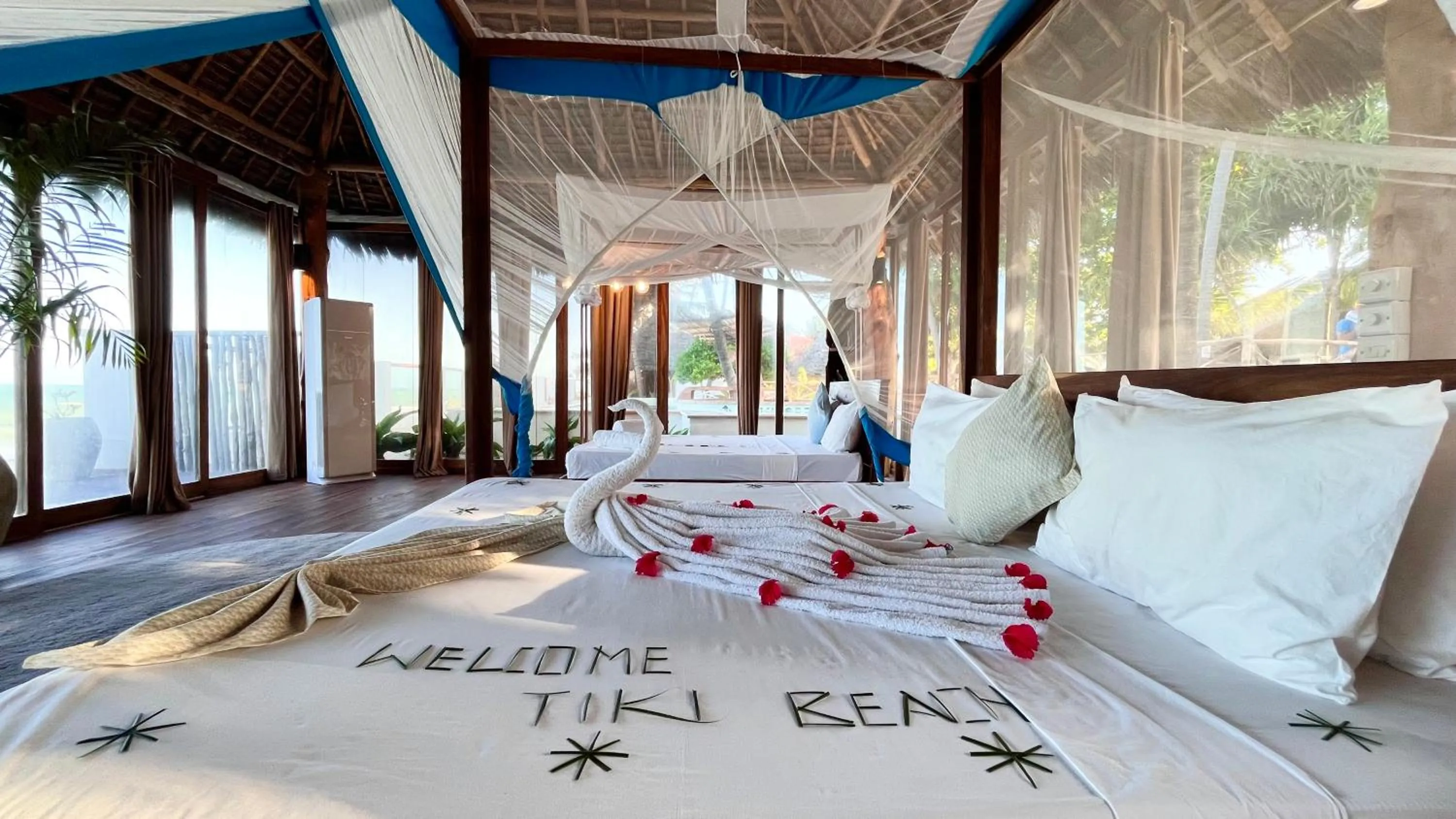 Bed in TIKI Beach Club & Resort