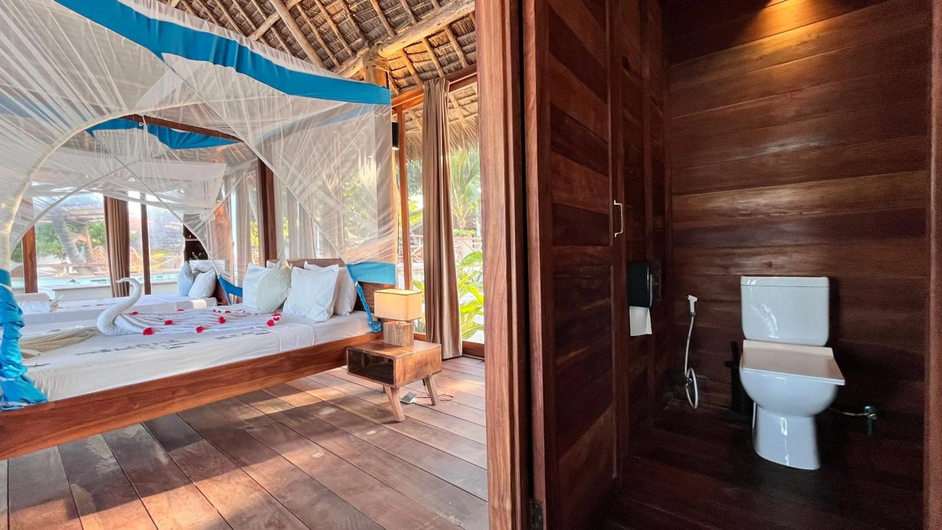 Bed in TIKI Beach Club & Resort