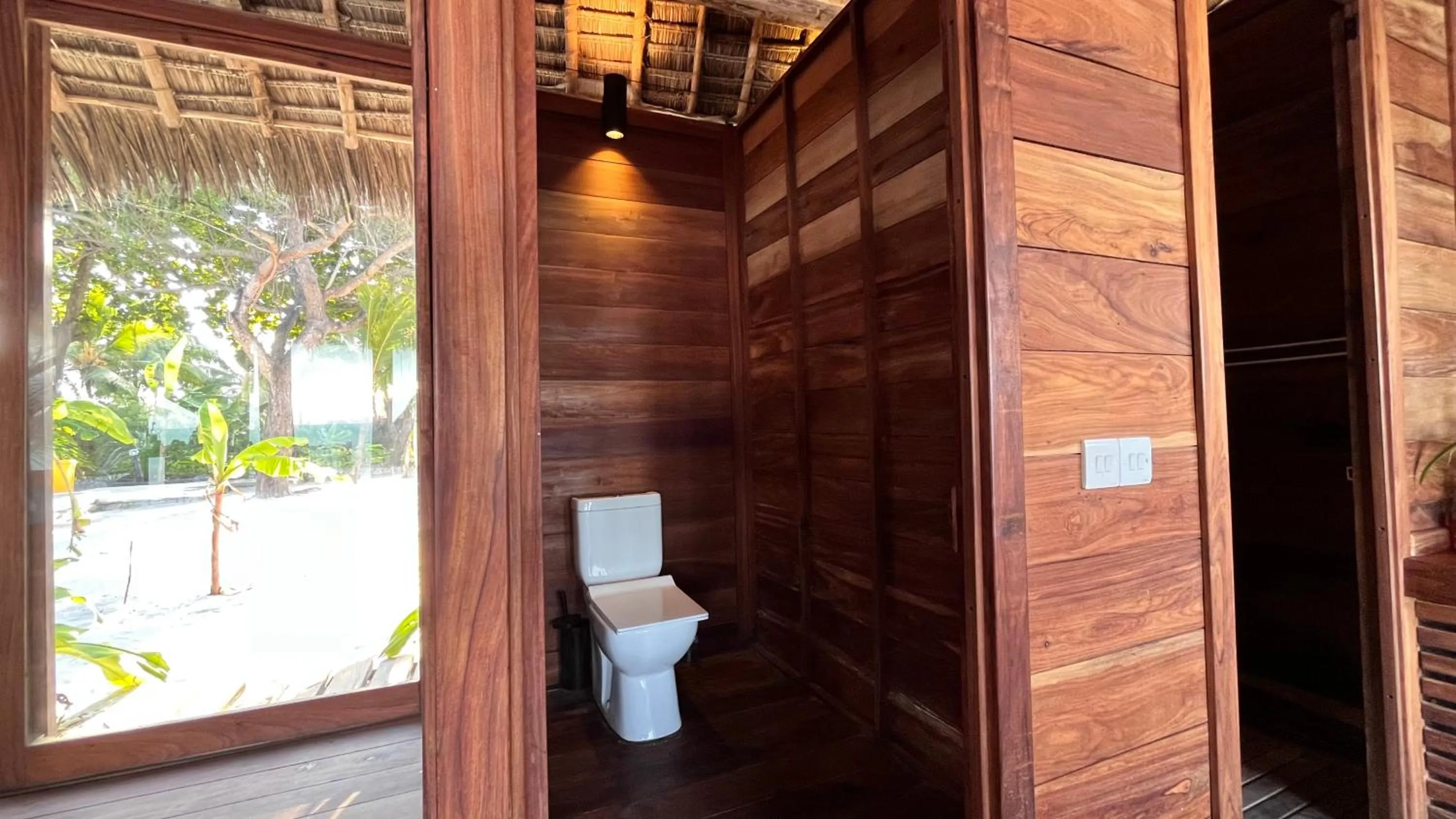 Toilet in TIKI Beach Club & Resort