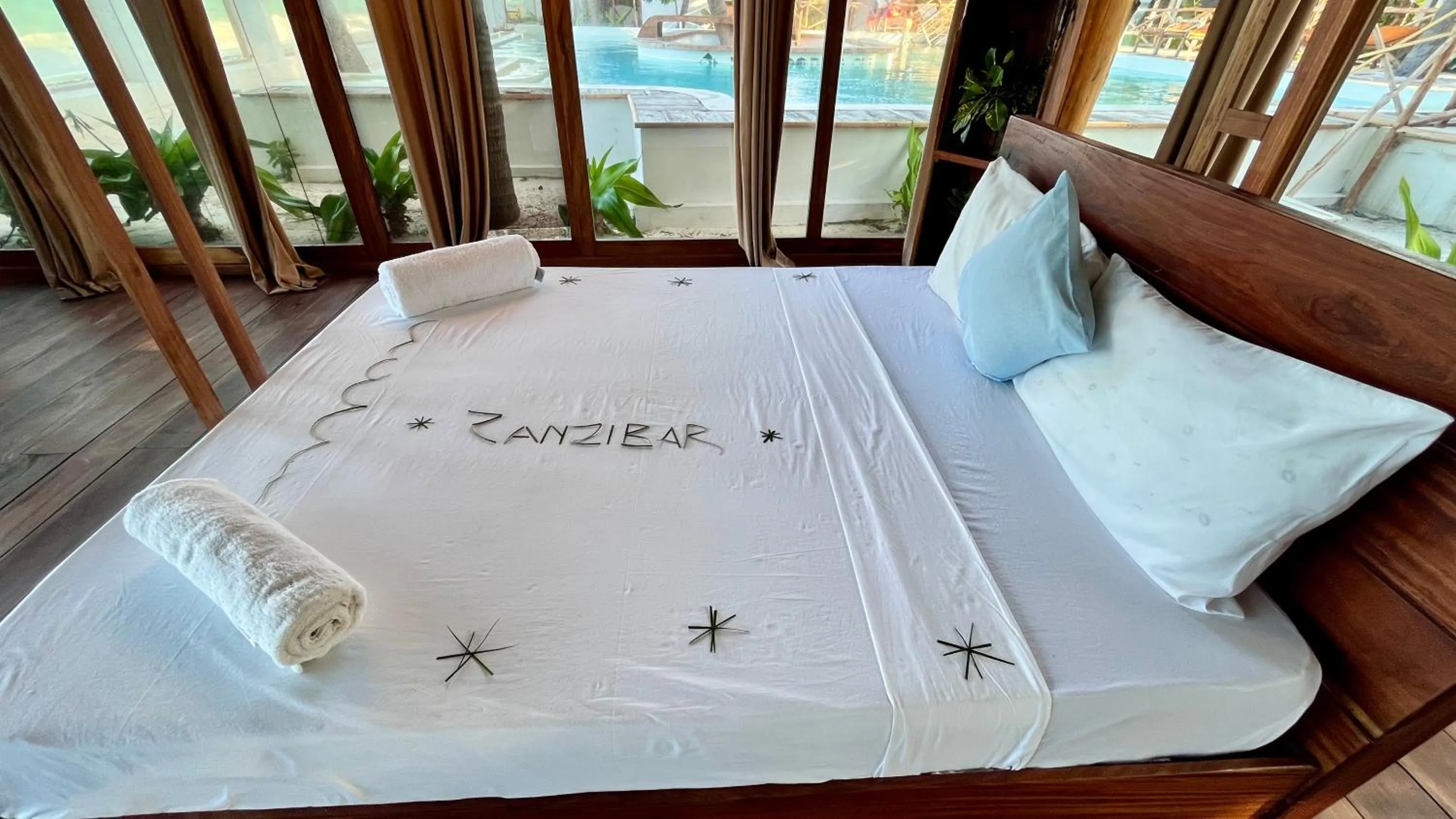 Bed in TIKI Beach Club & Resort