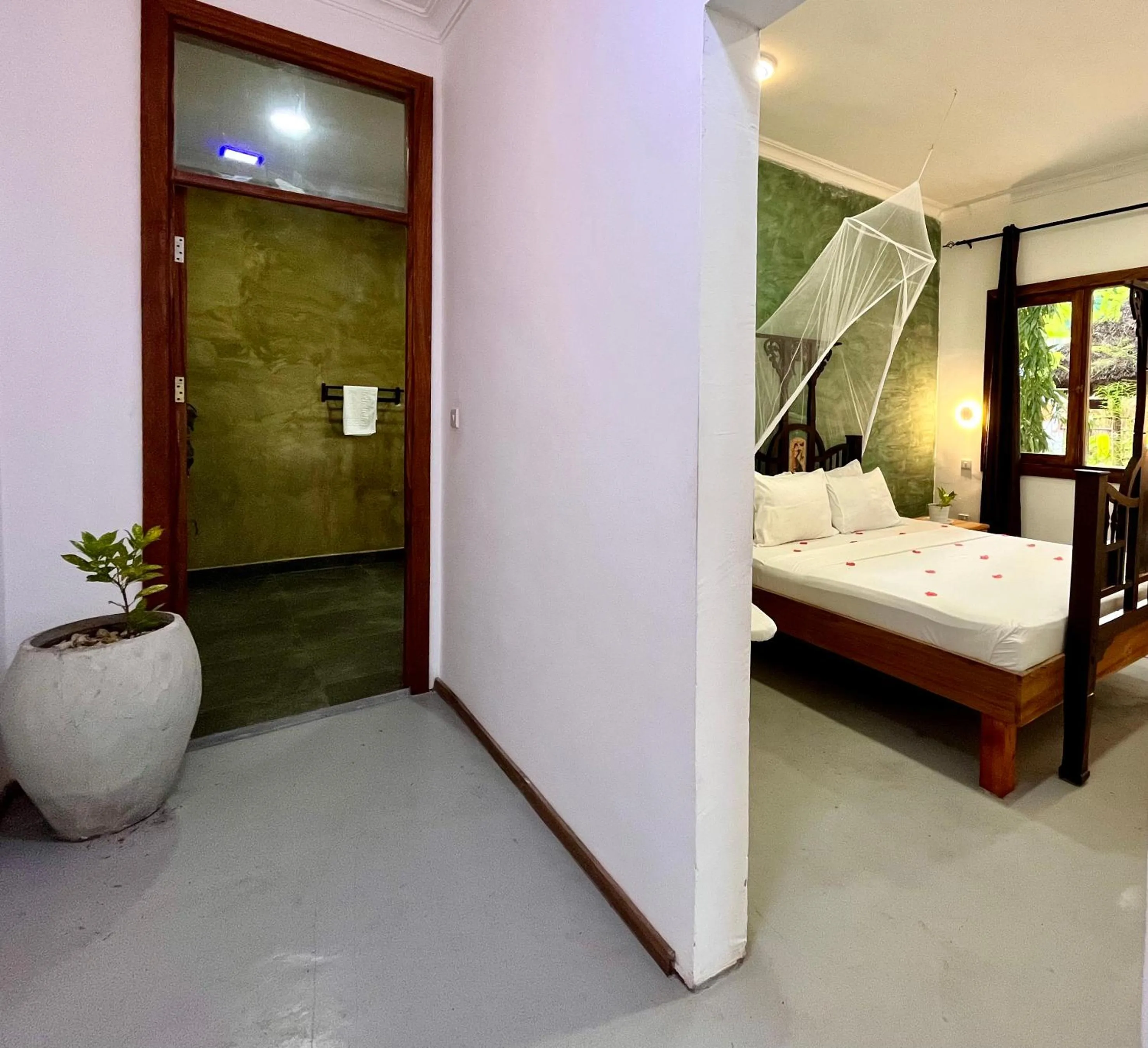 Bed in TIKI Beach Club & Resort