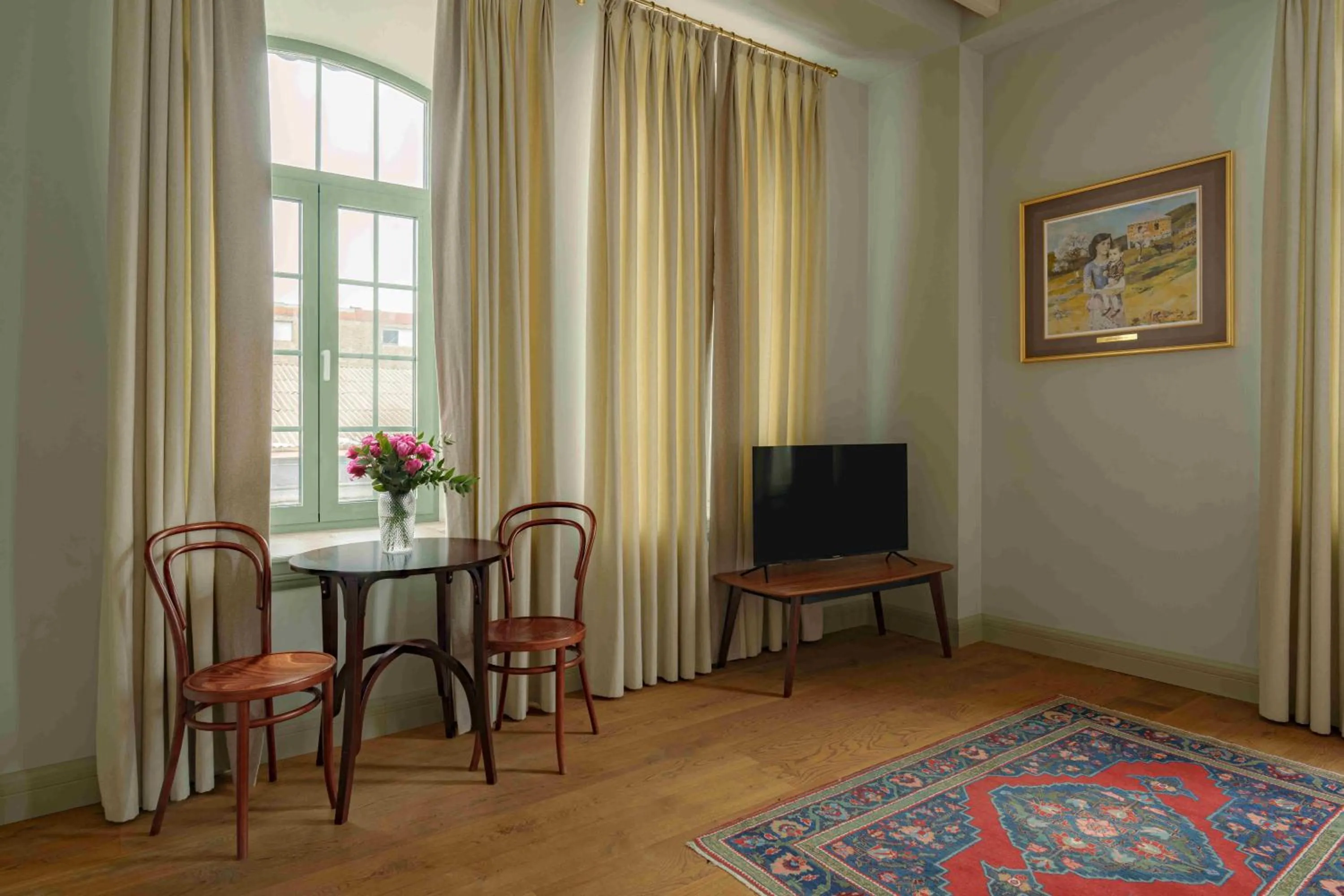 Seating area in GRAND HOTEL GYUMRI by APRICOT Hotels