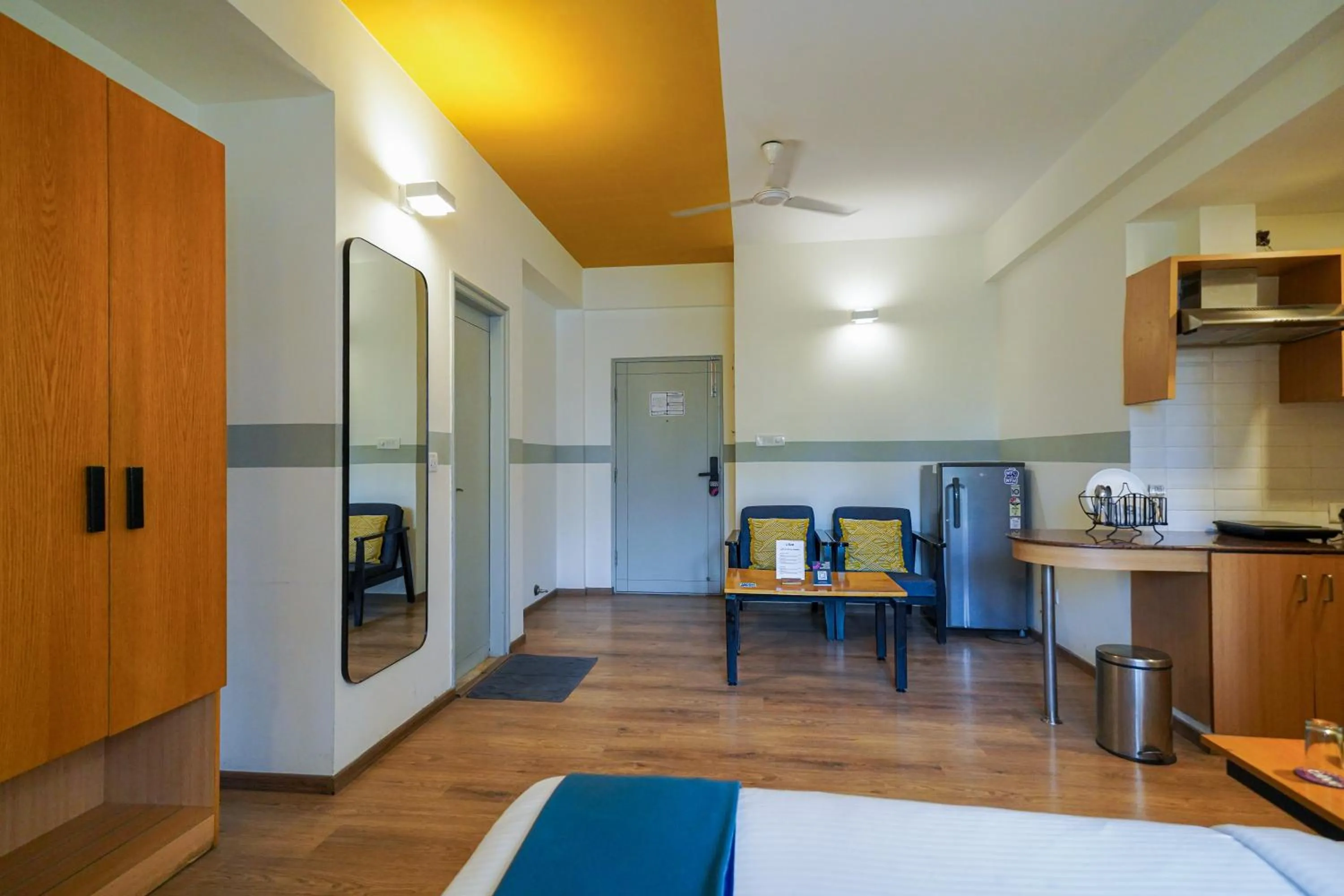 Seating area, Bed in Olive Hotel Magrath by Embassy Group