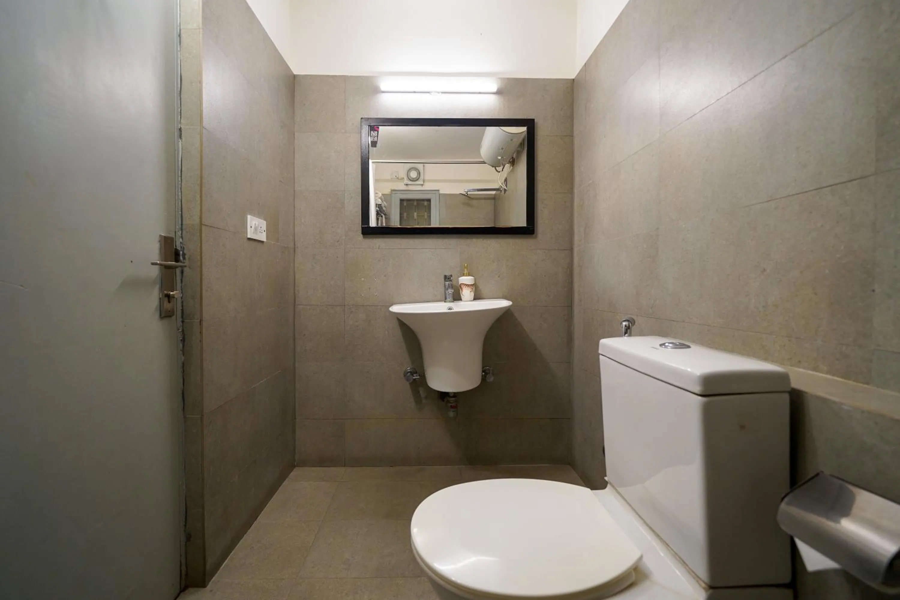 Bathroom in Olive Hotel Magrath by Embassy Group