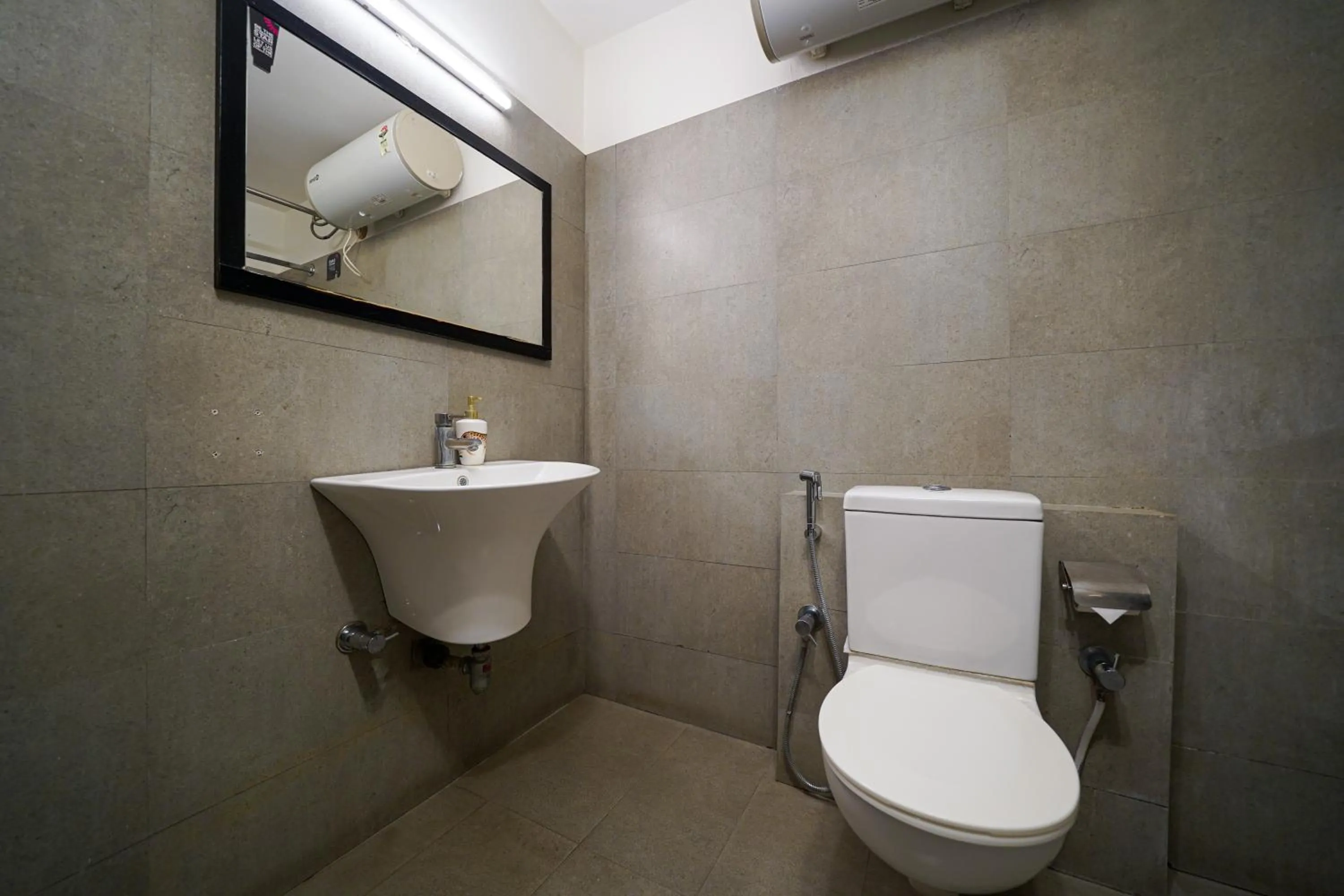 Bathroom in Olive Hotel Magrath by Embassy Group