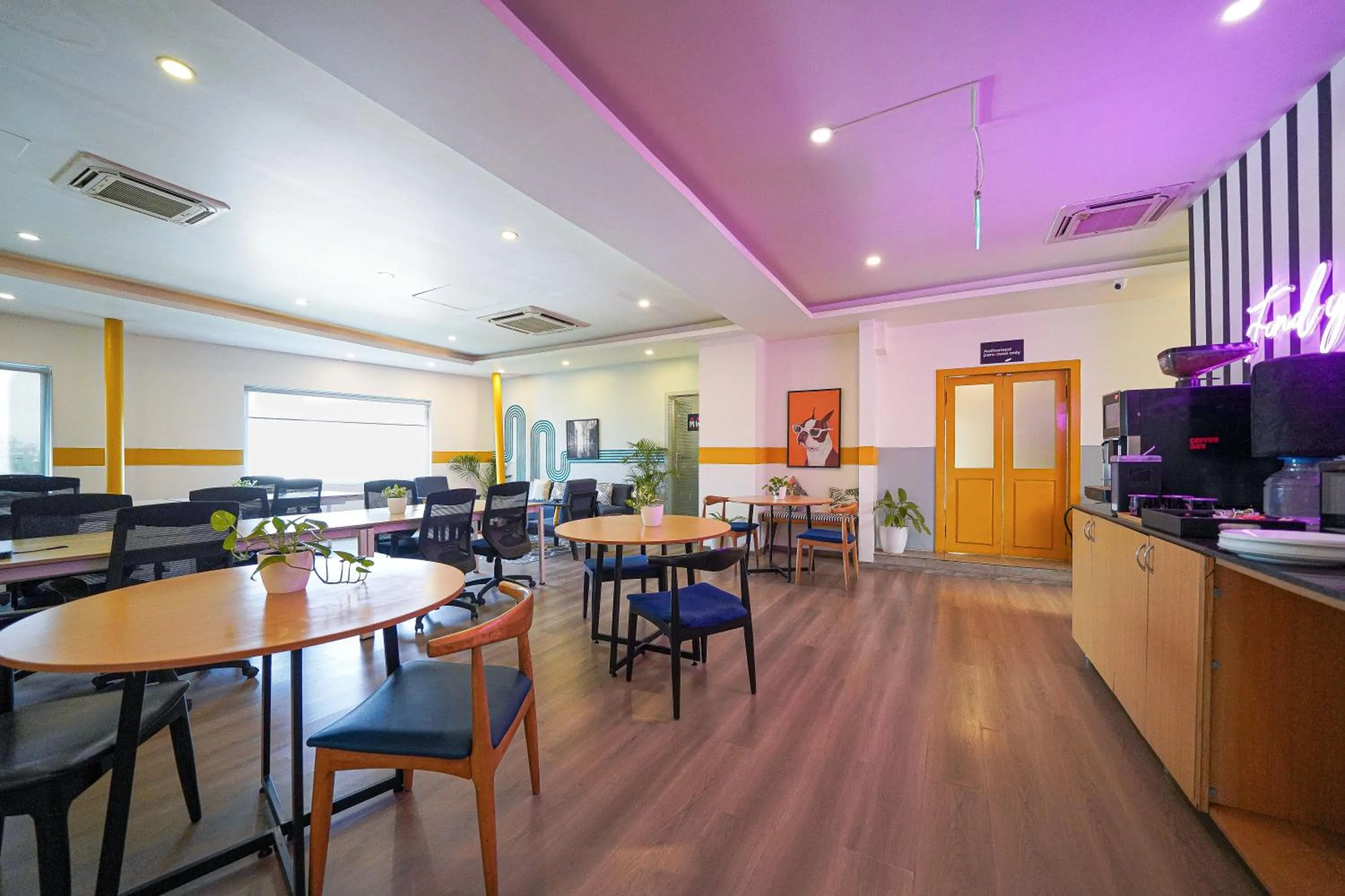 Seating area in Olive Hotel Indiranagar by Embassy Group