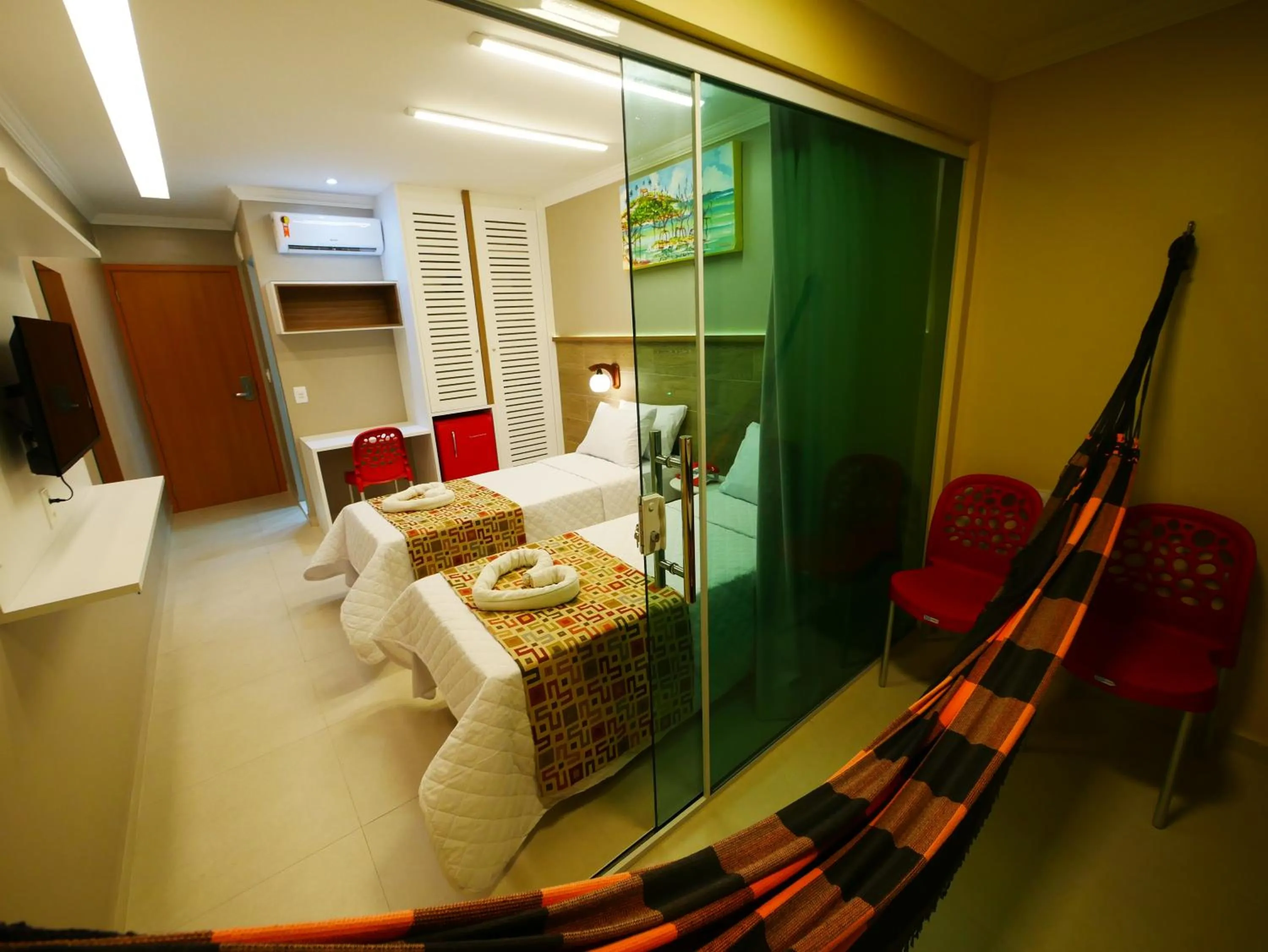 Bed in Pousada Recanto dos Corais