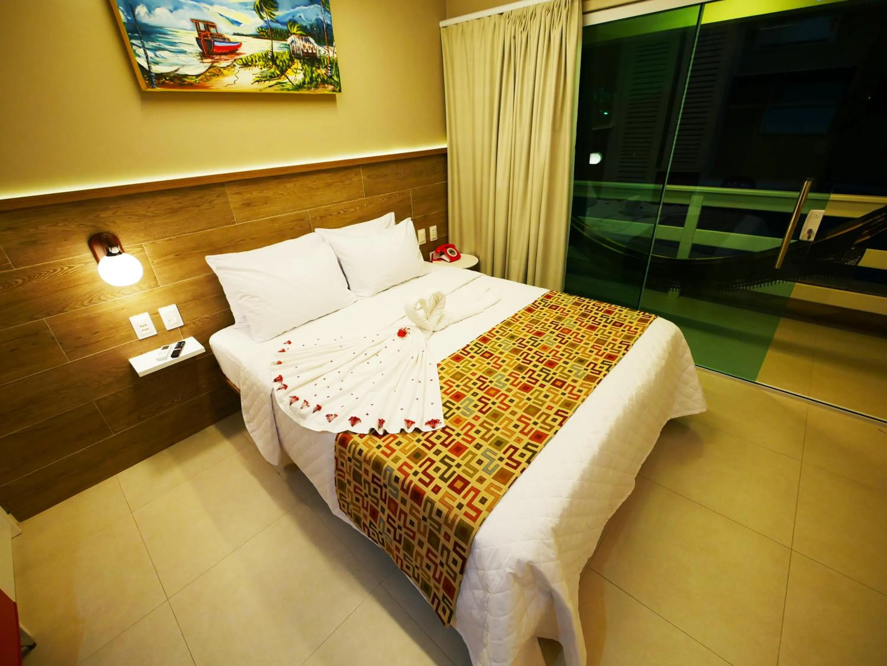 Bed in Pousada Recanto dos Corais