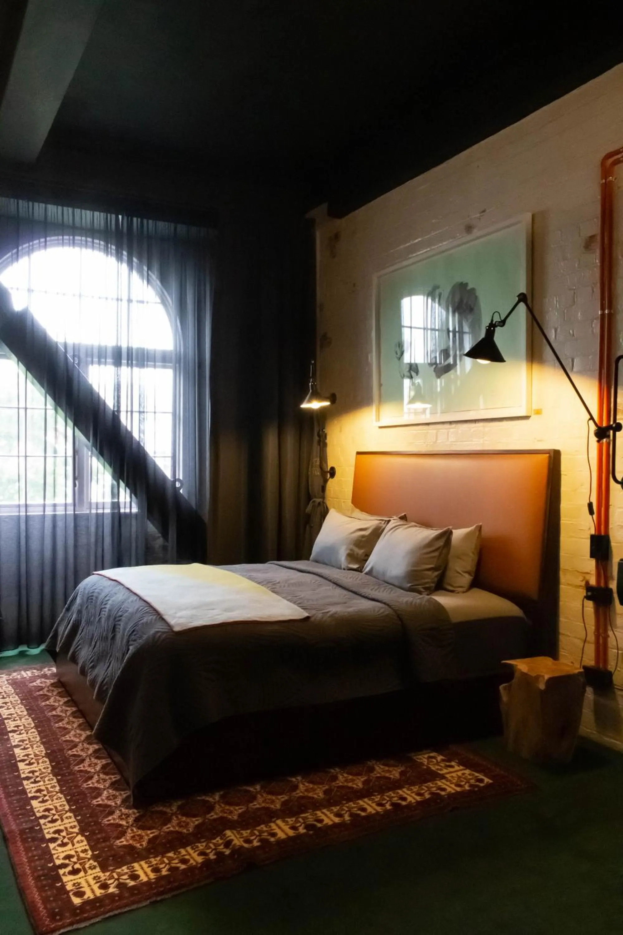 Bed in The Intrepid Hotel