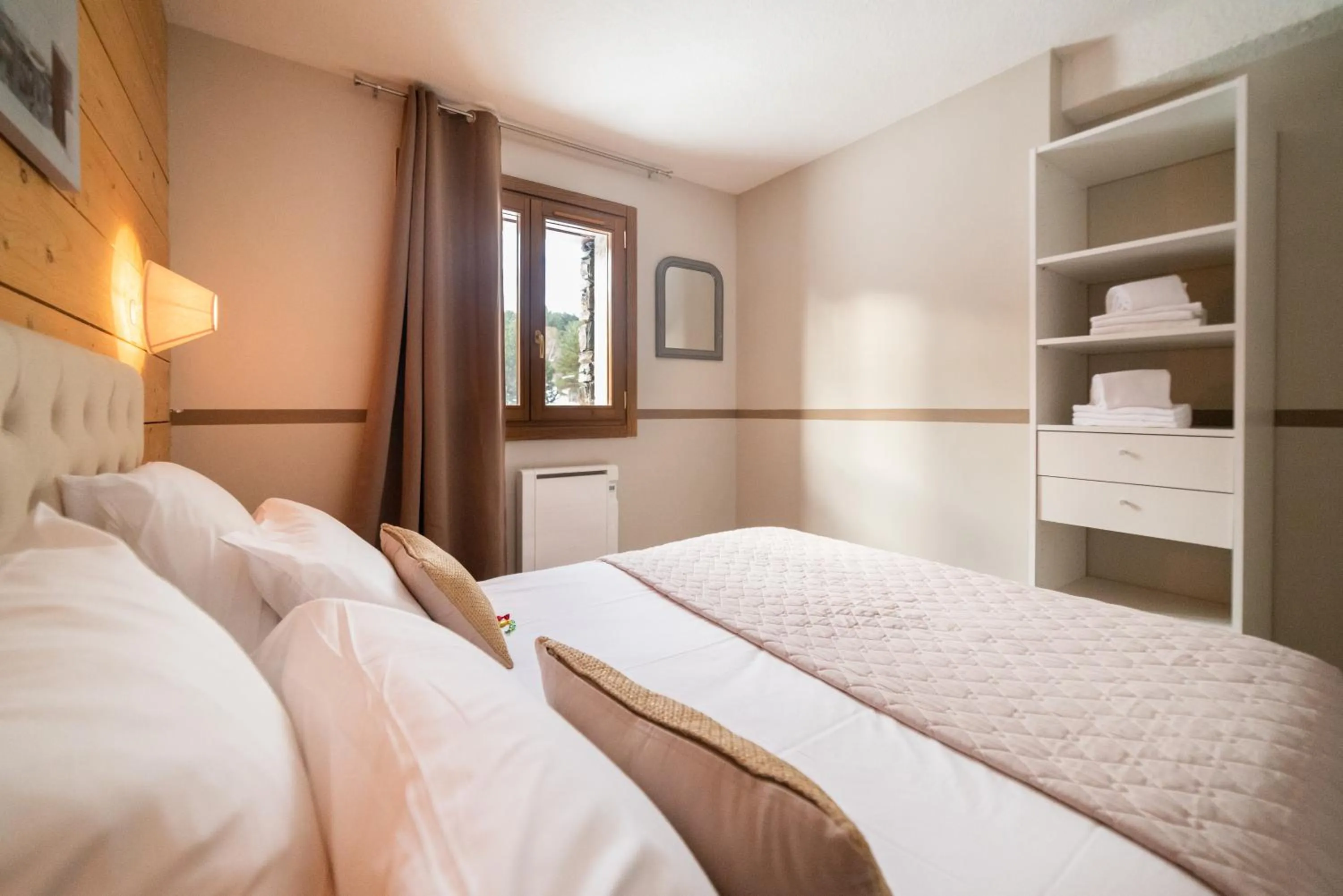 Bedroom in Résidence Les Esplaneilles