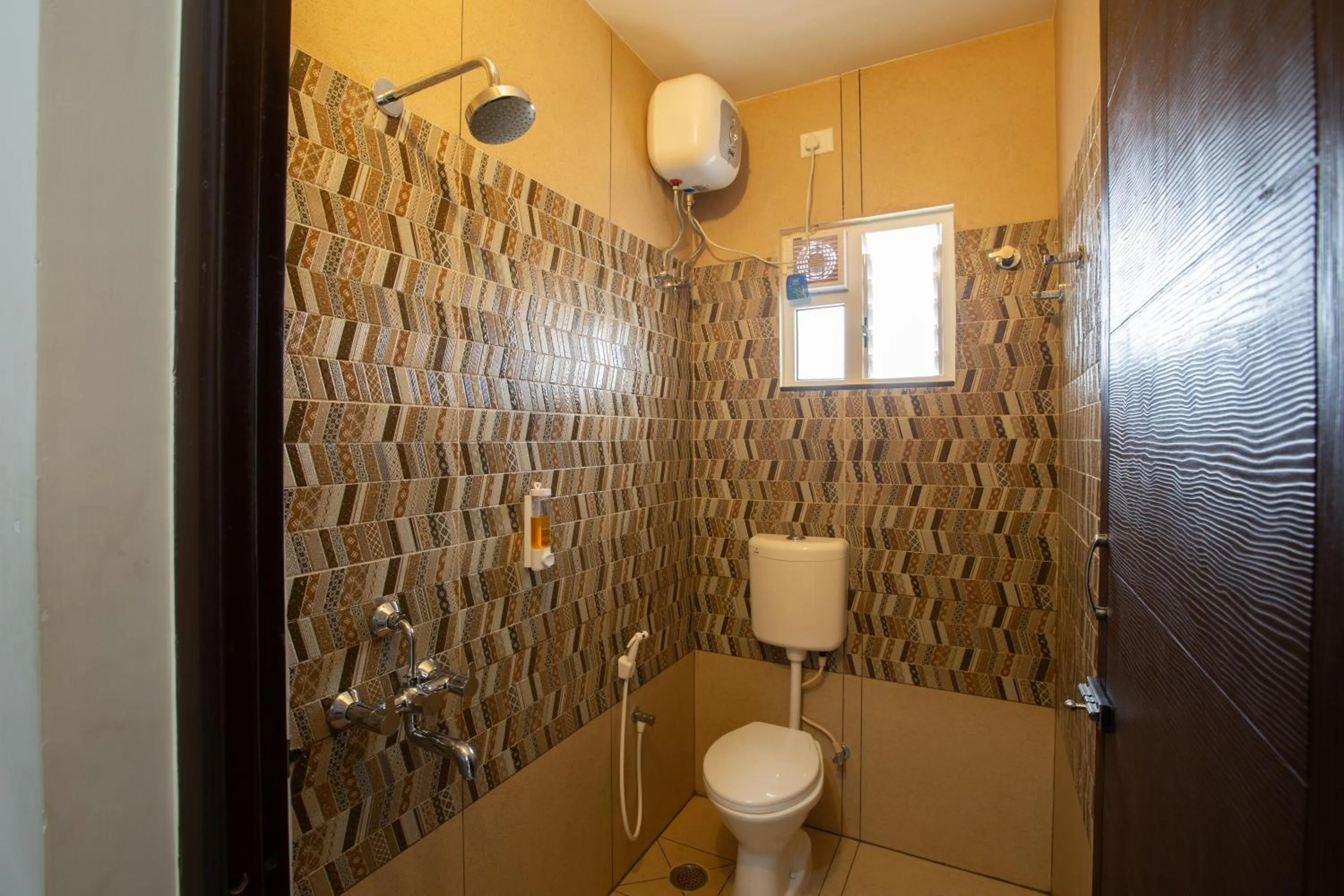 Toilet in Sarvam Serviced Apartment