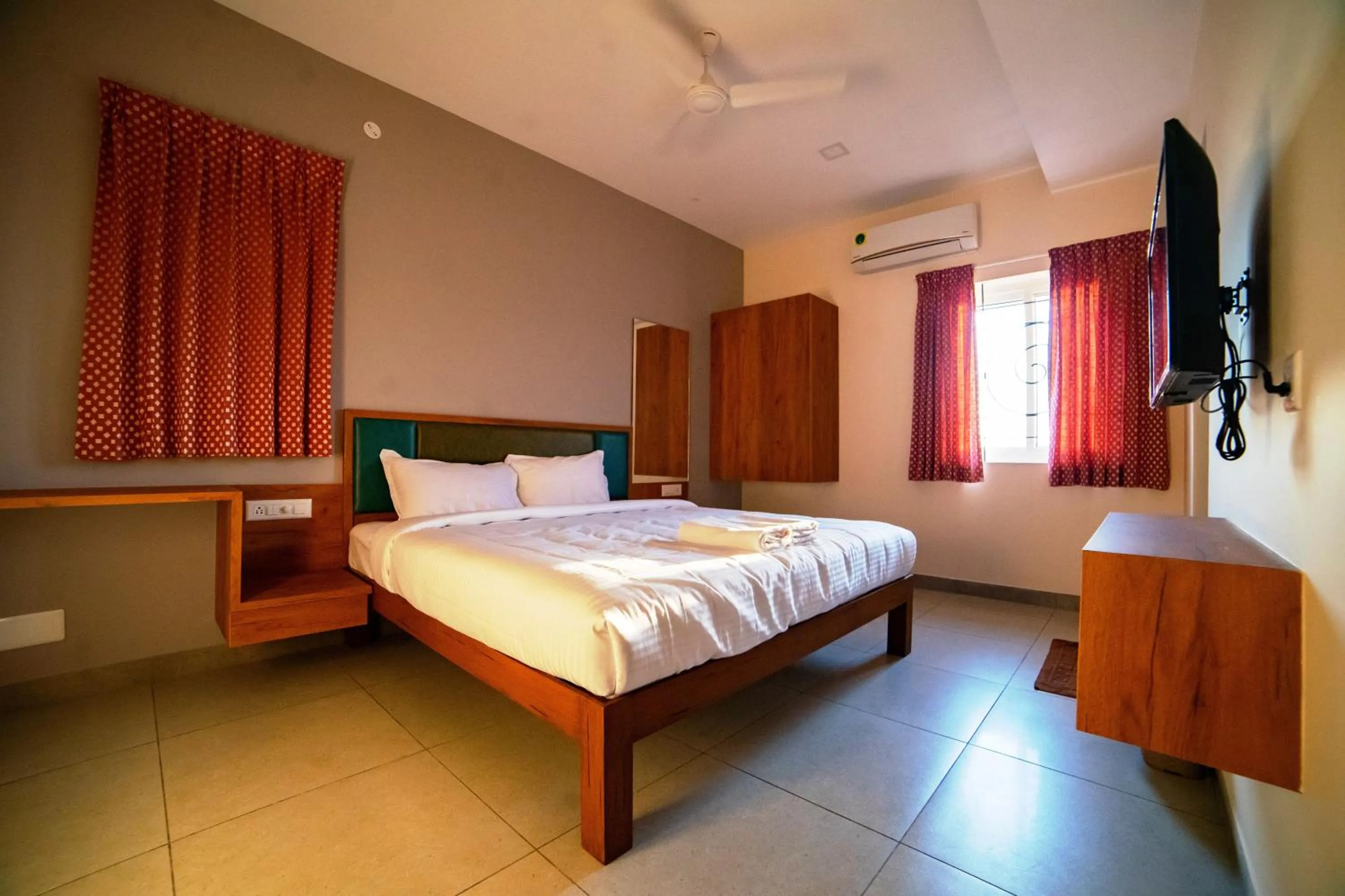 Bed in Sarvam Serviced Apartment