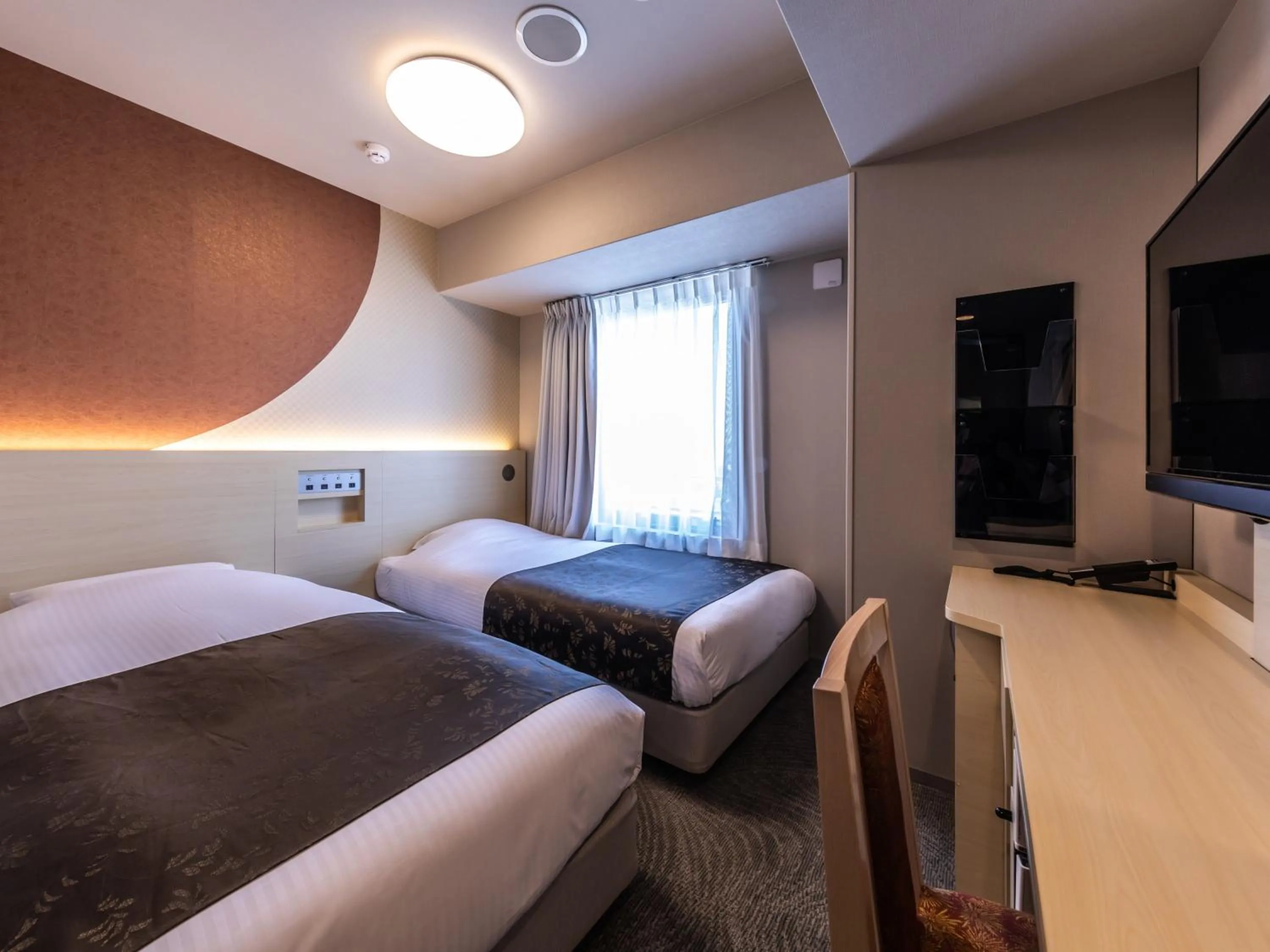Photo of the whole room, Bed in APA Hotel Shin Osaka Ekimae Tower